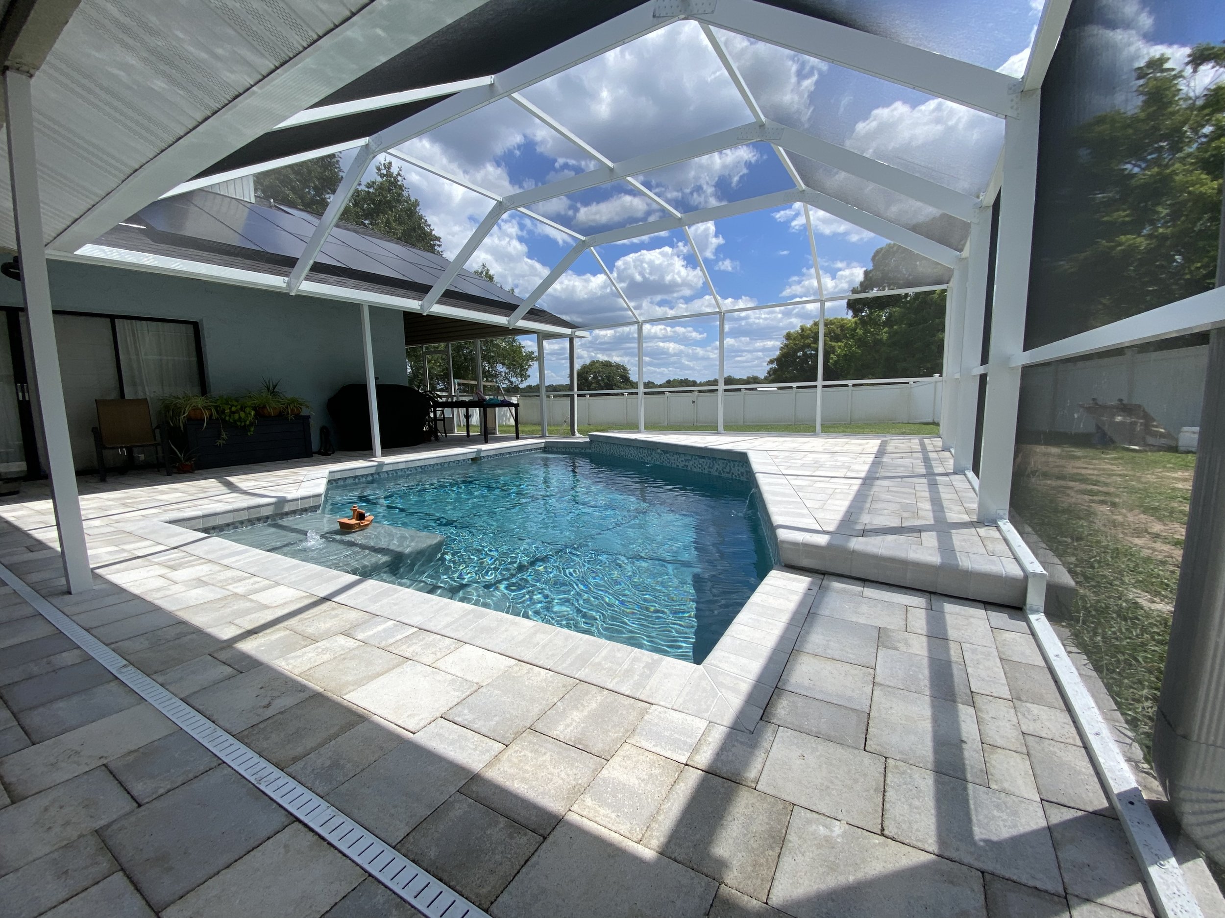 Lanai Guy rescreening a lanai in Plant City, FL.