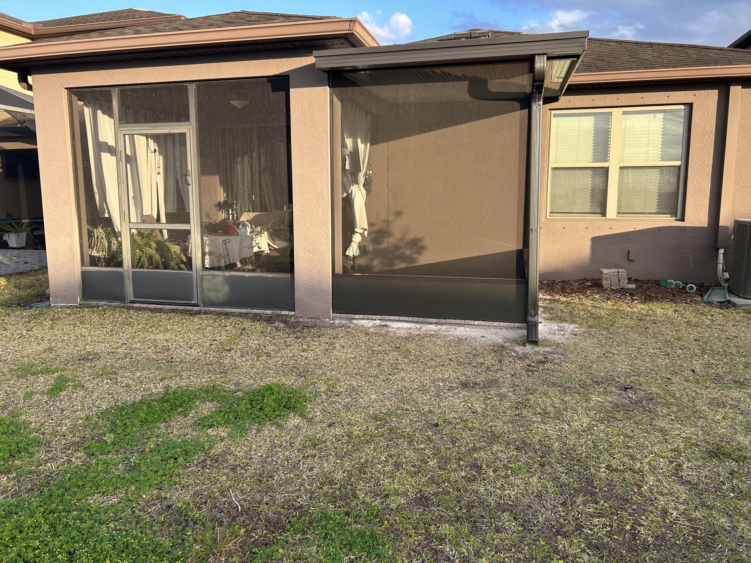 Lanai Guy rescreening a lanai in Plant City, FL.