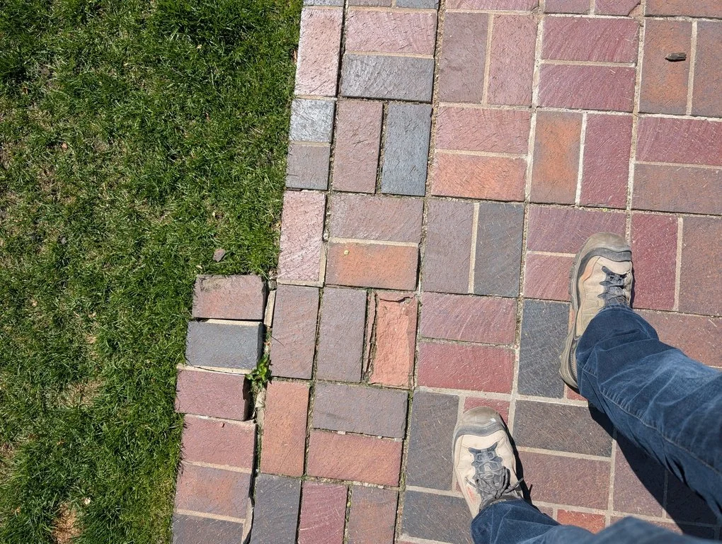 Masonry steps at the front entrance of a house