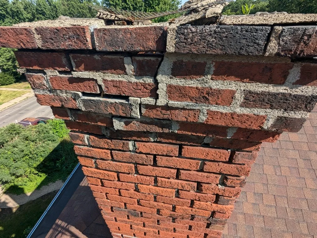 An old stone foundation wall below grade