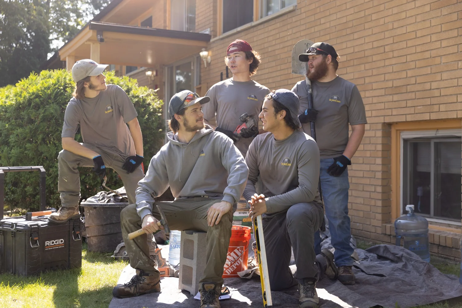 The Golden Stones crew at work on a masonry job at a brick home