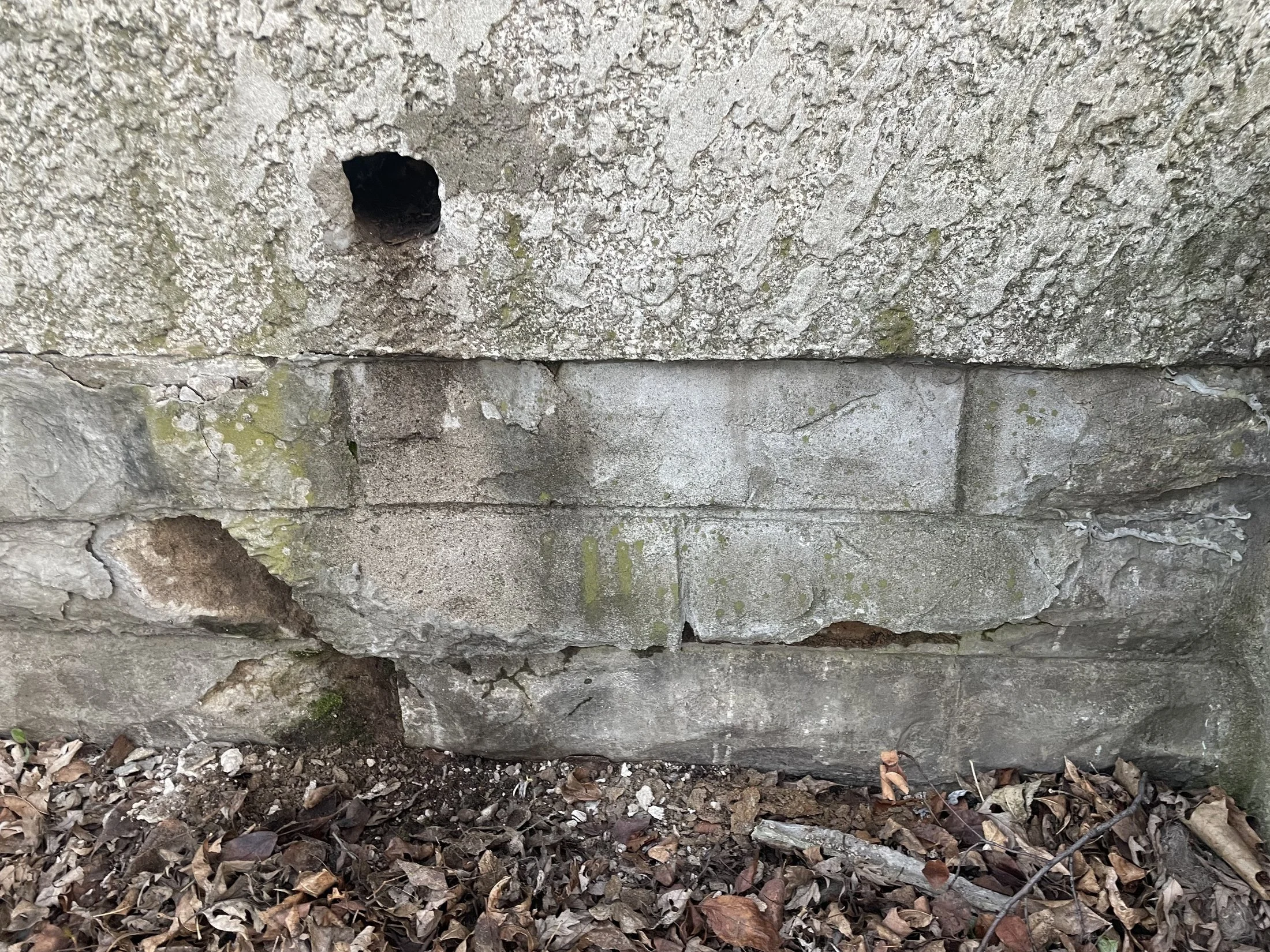A Twin Cities brick facade weathered by freeze and thaw