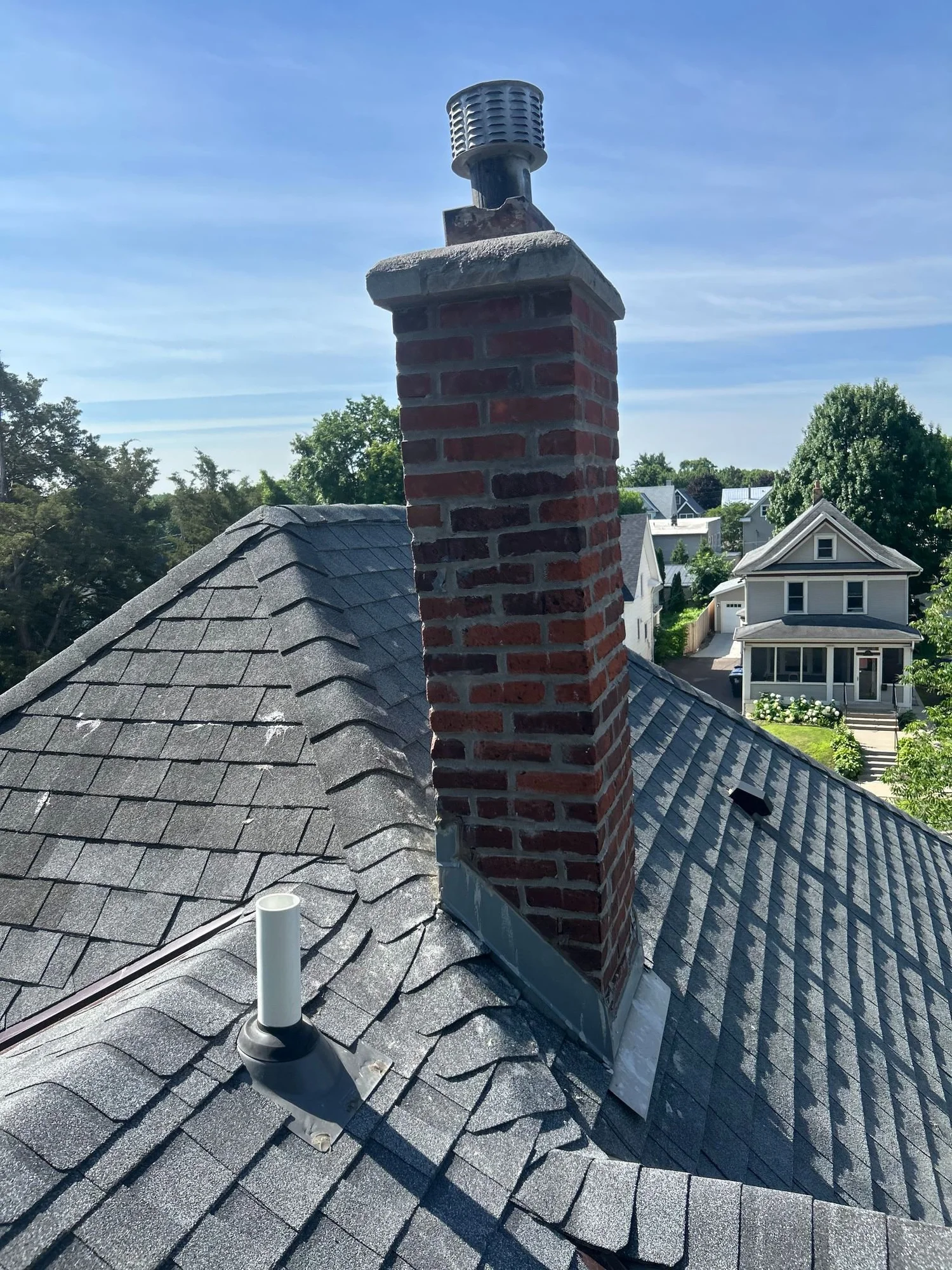Mortar repointing on a brick chimney