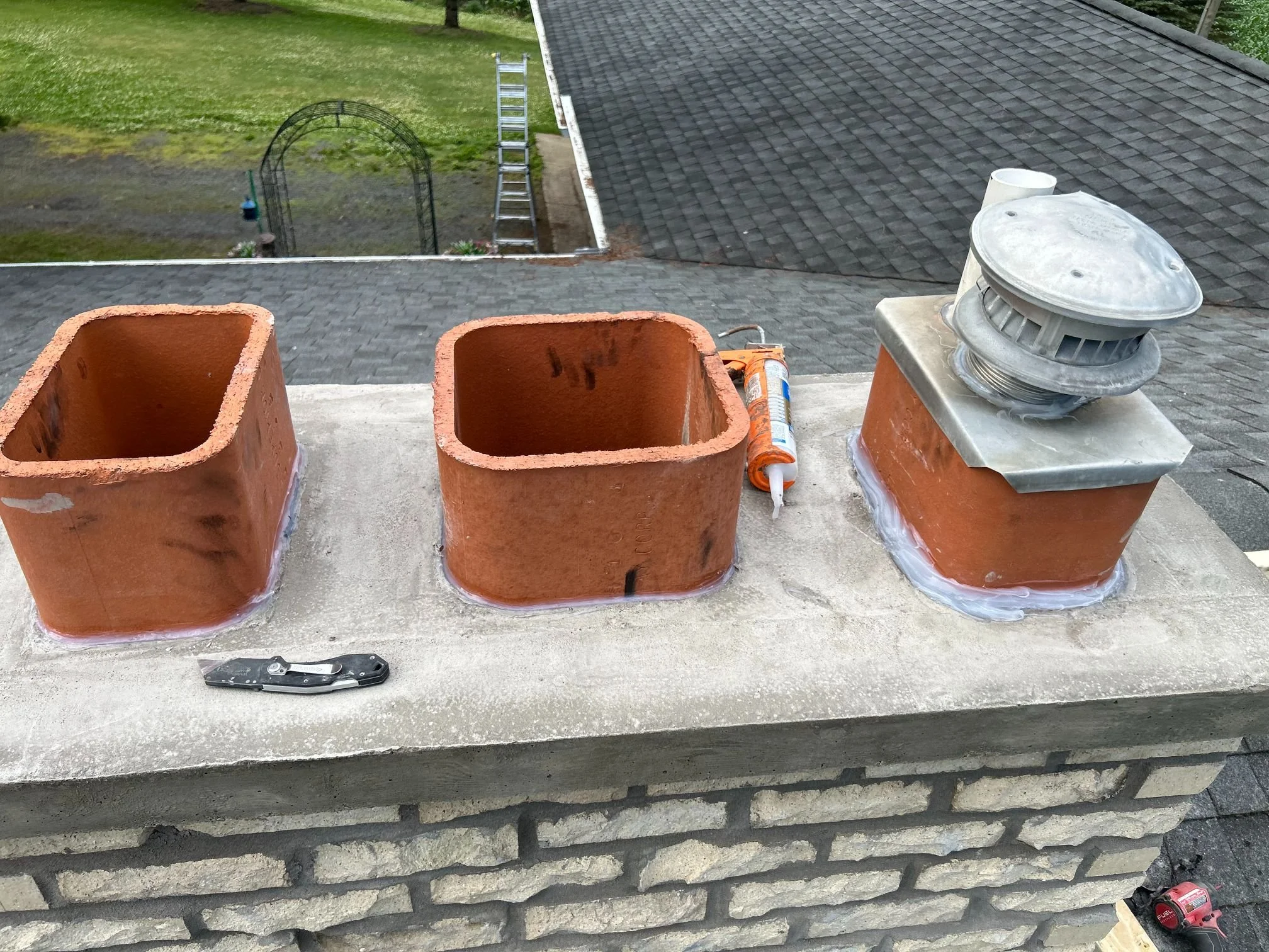 Mason repointing a brick wall in the Twin Cities