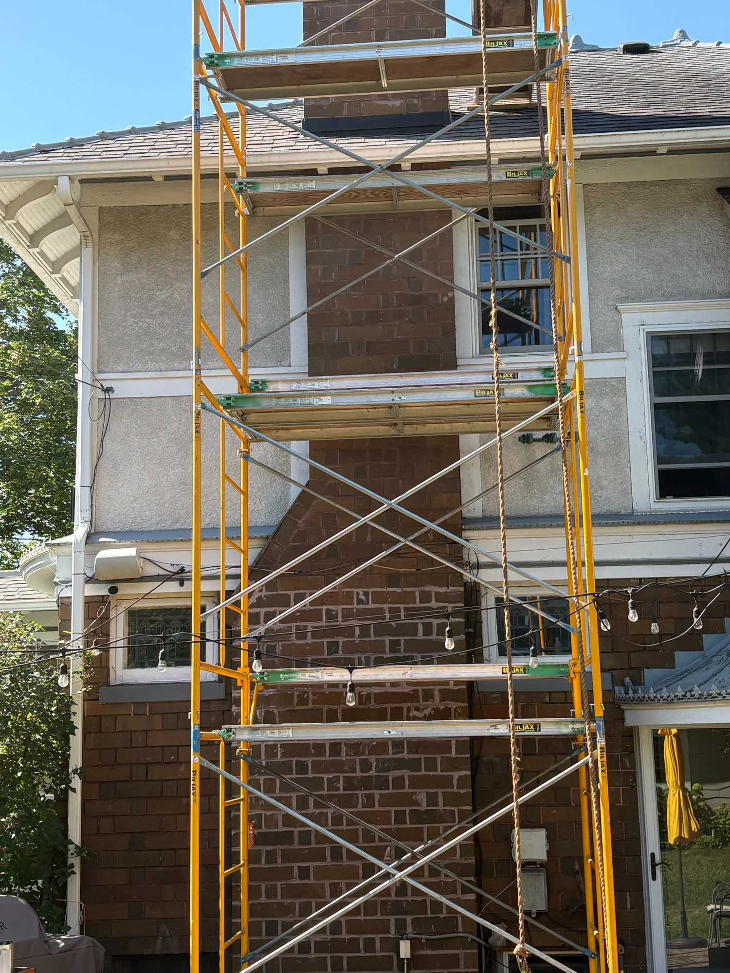Mortar repair being done on brick masonry