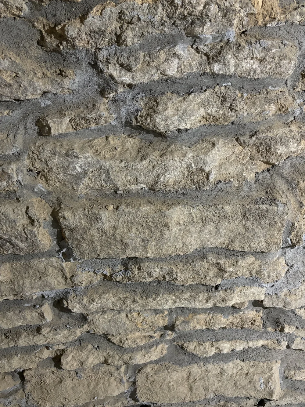 Close detail of repointed brick mortar joints