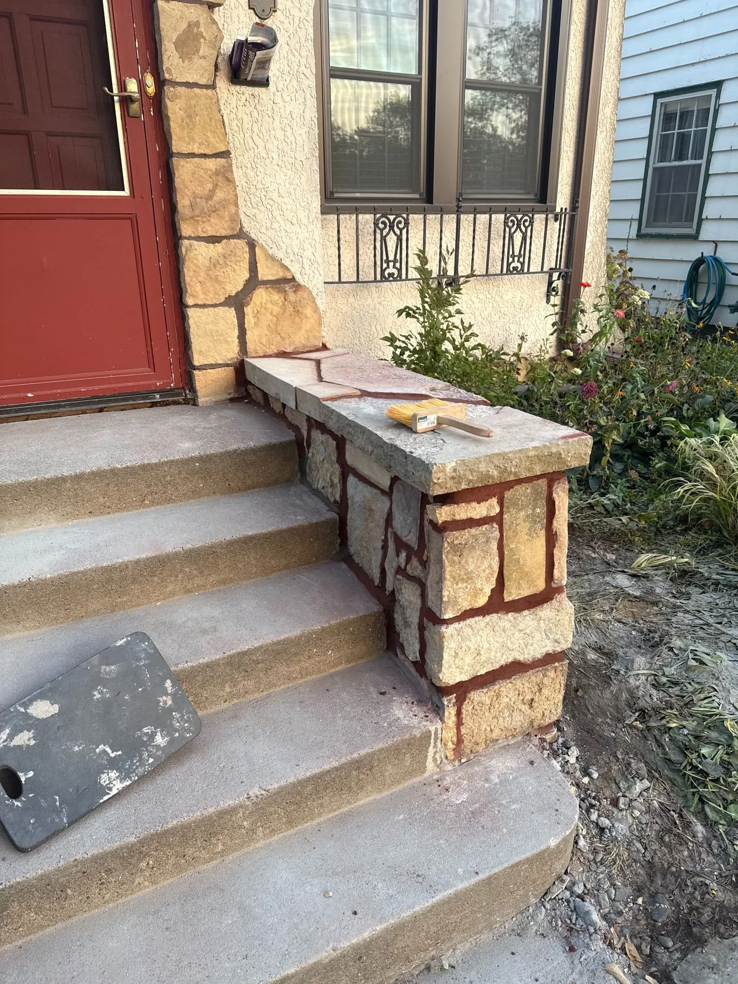 An old stone foundation wall below grade