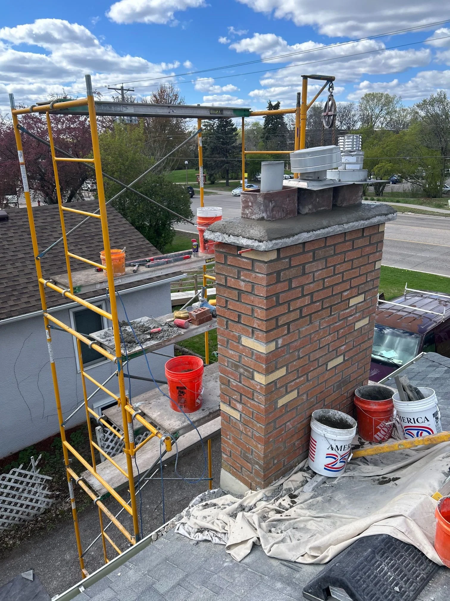 Mortar being mixed on site to the specification chosen for the wall