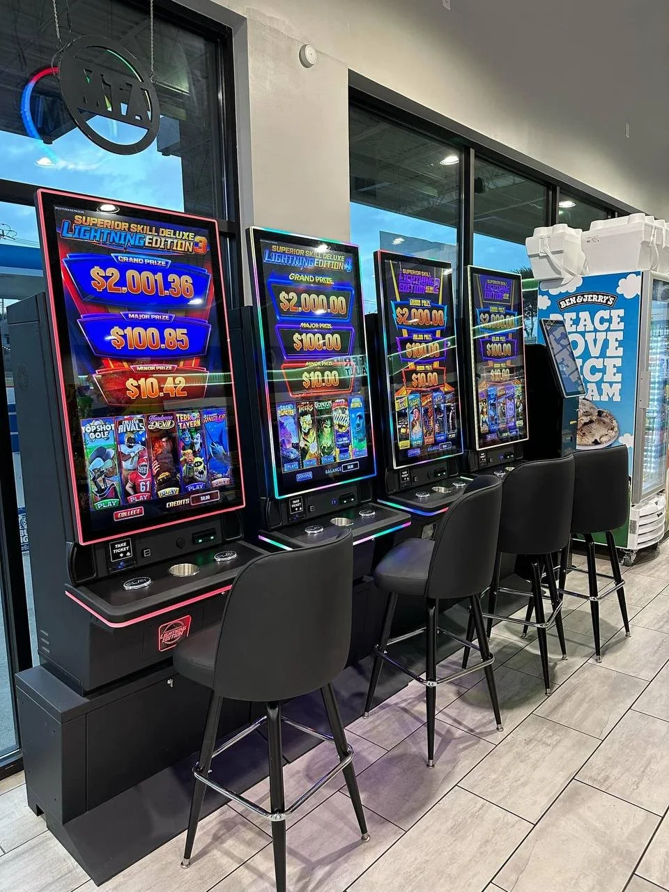 Supplied skill game reference showing several illuminated floor-standing cabinets in a venue