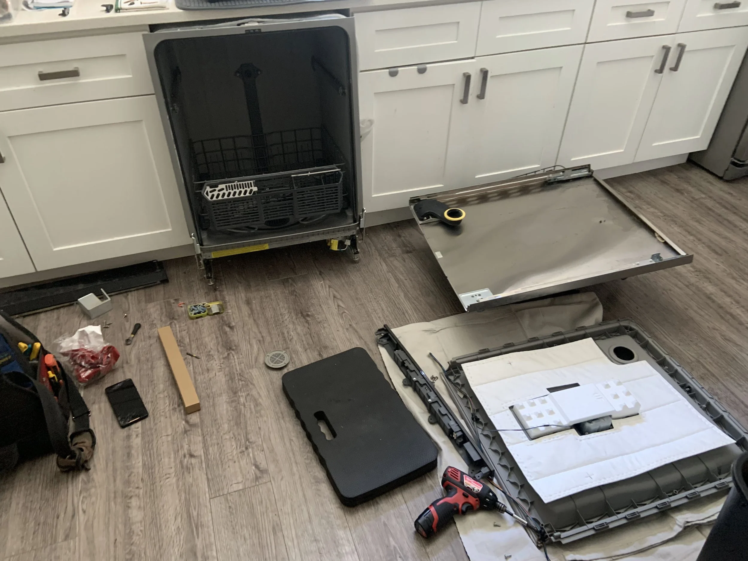 Dishwasher pulled out of the cabinet during a Spokane appliance repair by SD Appliance