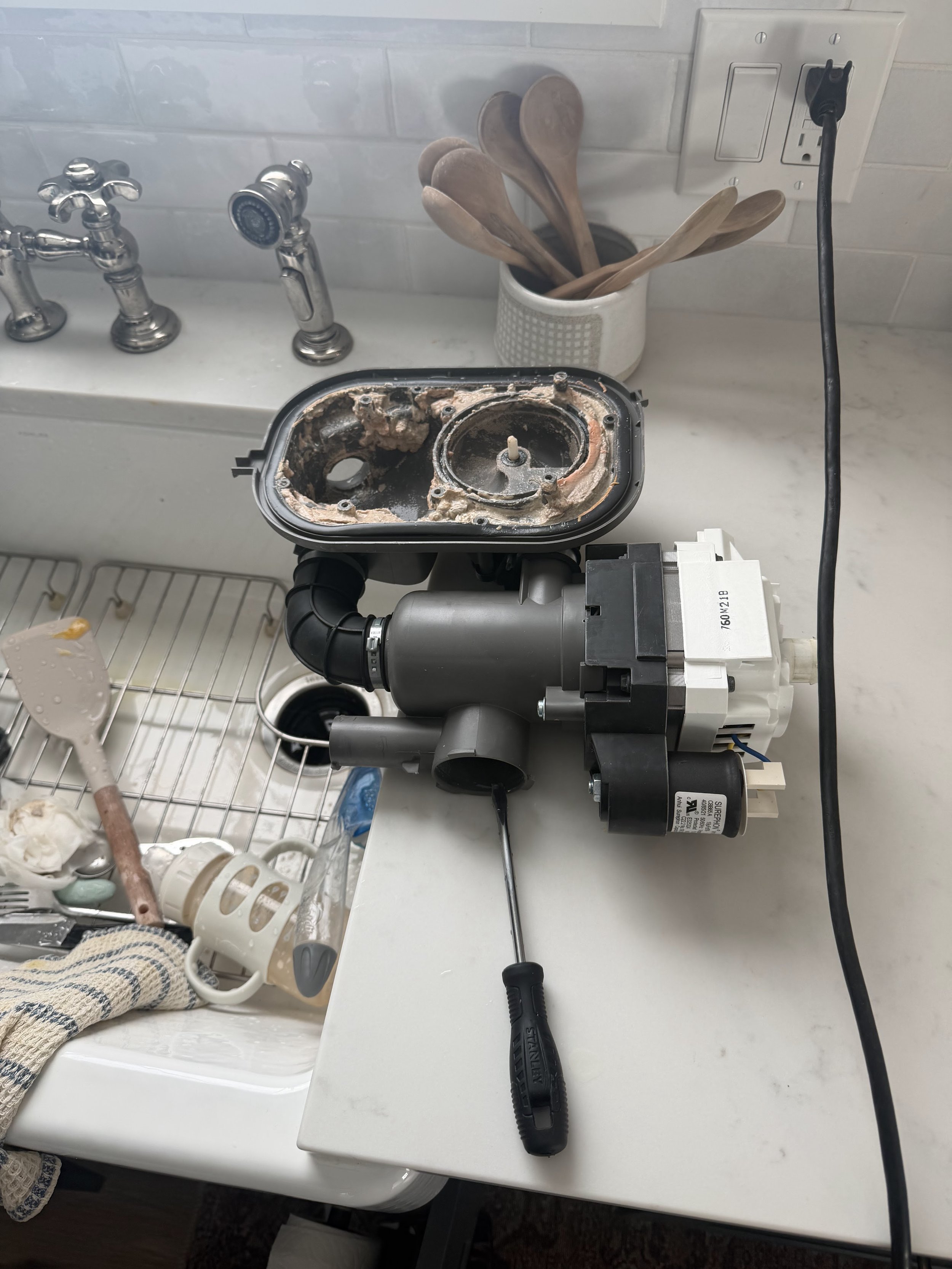 Dishwasher sump and pump assembly, the parts behind standing water in a Coeur d'Alene dishwasher