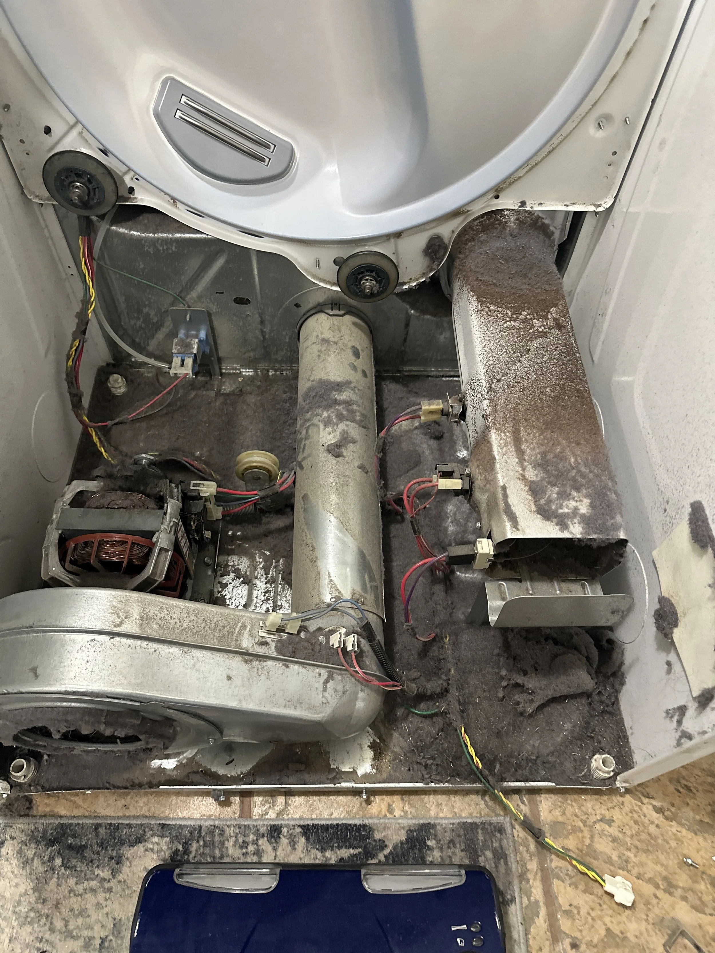 Burnt dryer duct and heating element during a Spokane dryer repair by SD Appliance