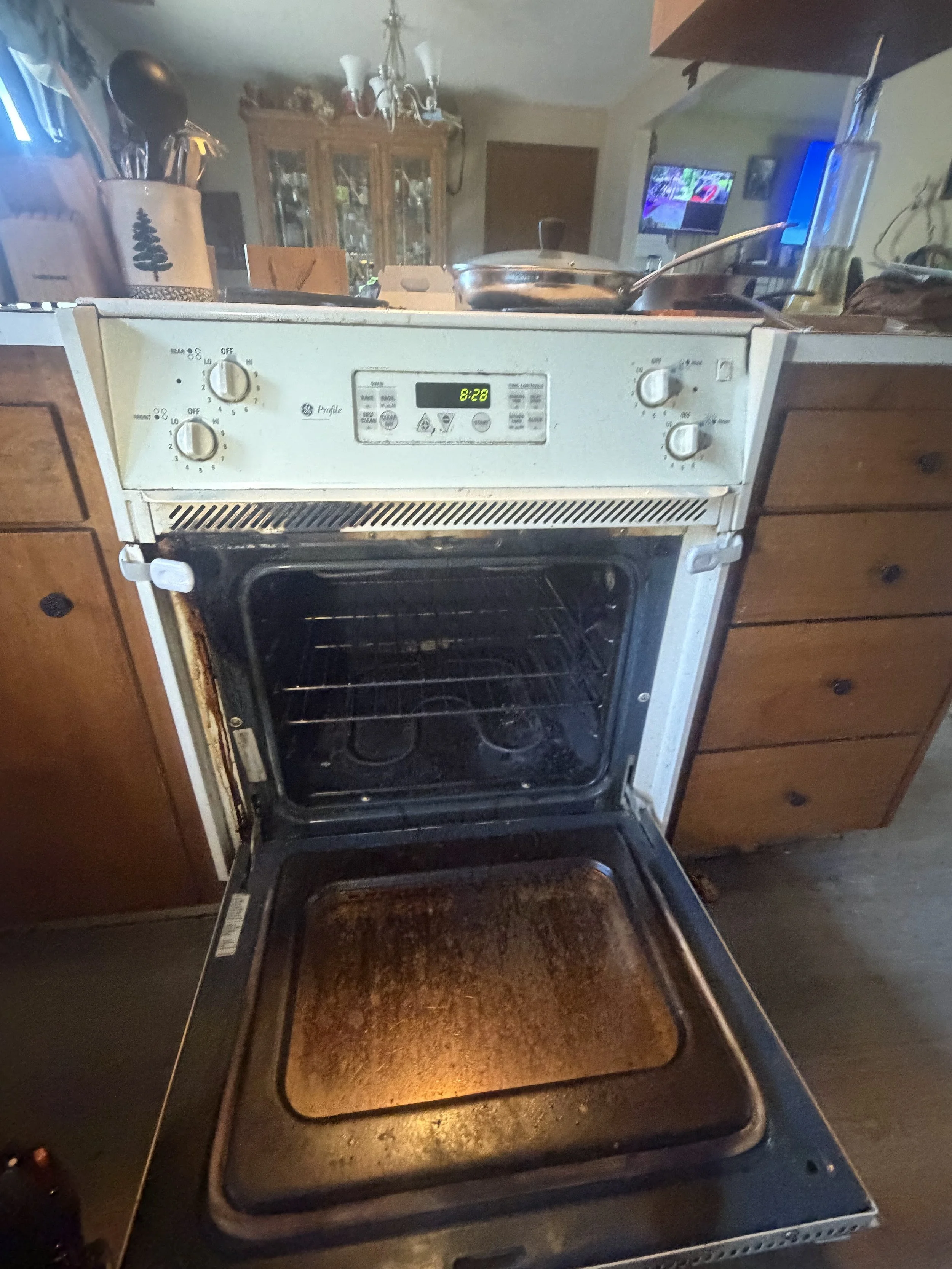 Oven cavity with the door open, checked after meter work in a Coeur d'Alene home