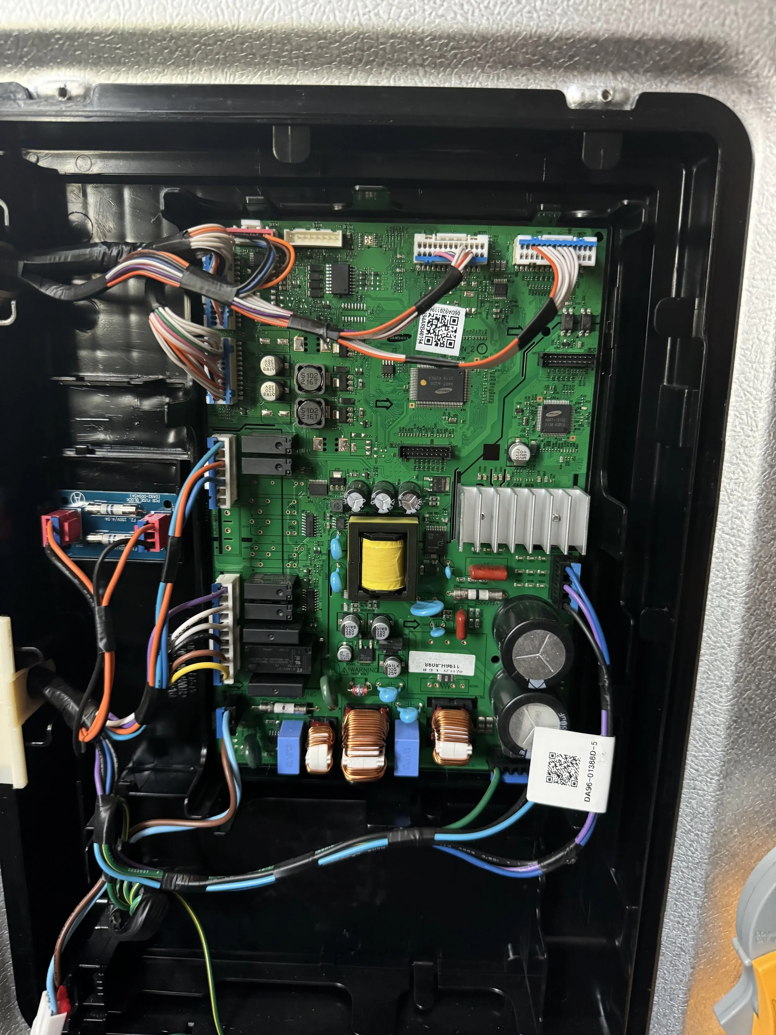A control board, capacitors and wiring