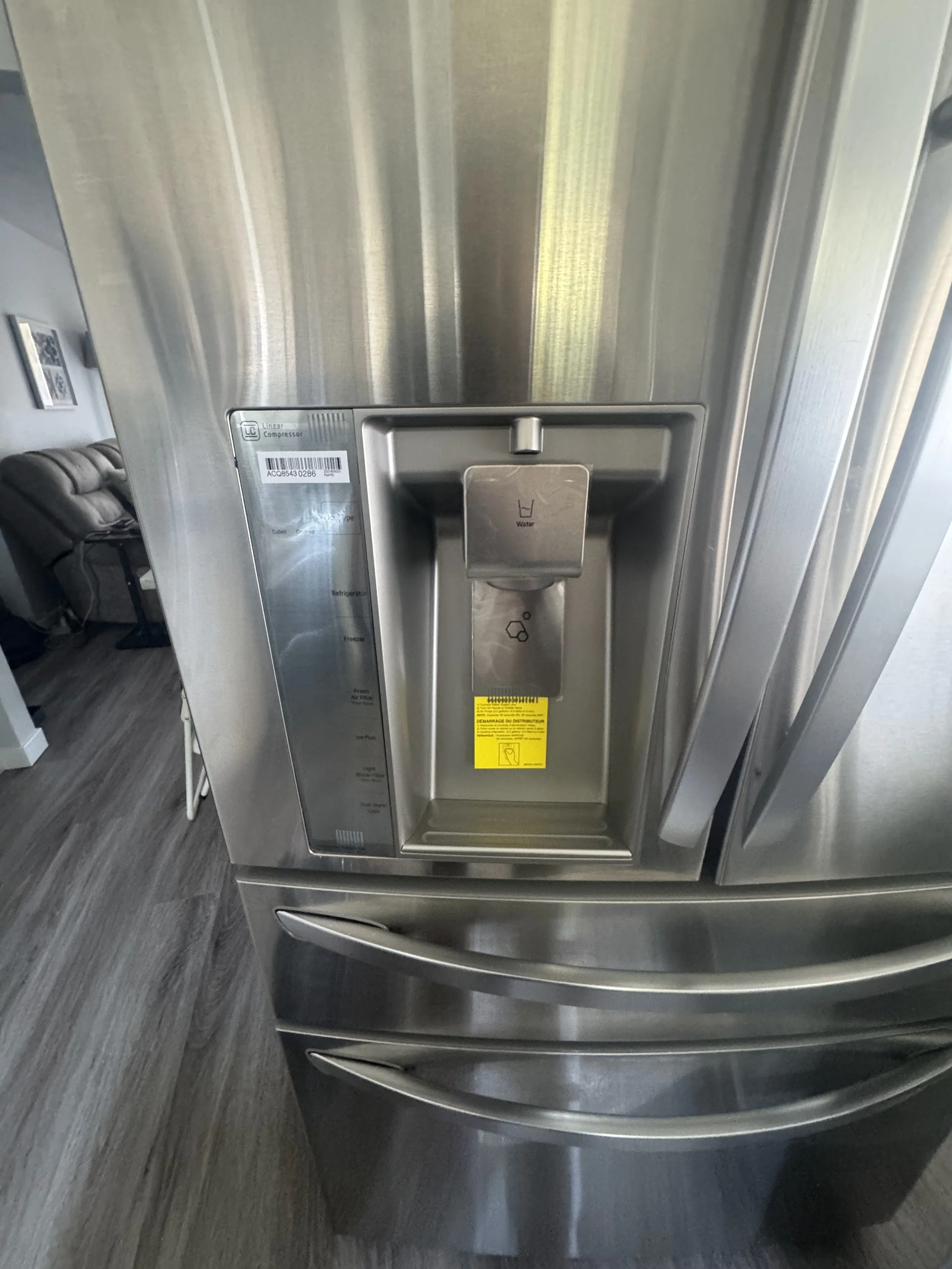 Refrigerator door open at the ice maker box