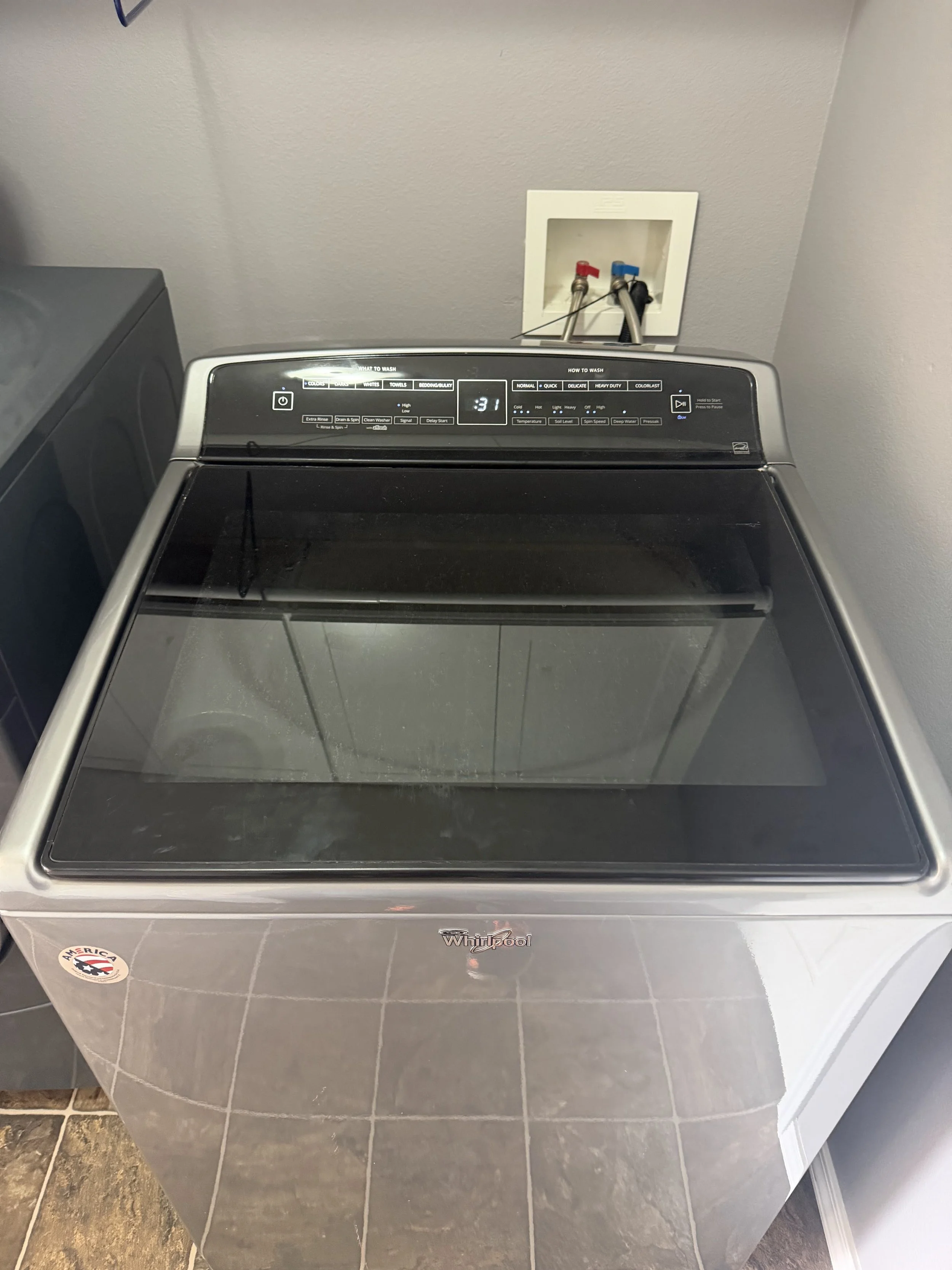 Stainless drawer liner / compactor box during a Spokane range hood repair by SD Appliance