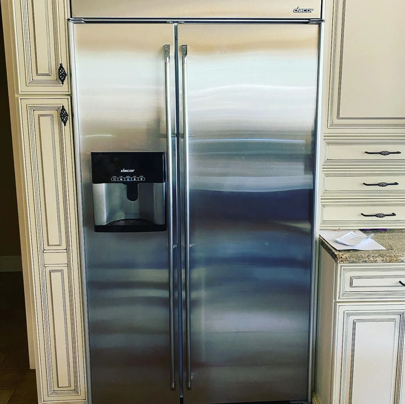 Built-in side-by-side refrigerator during a Spokane wine cooler repair by SD Appliance