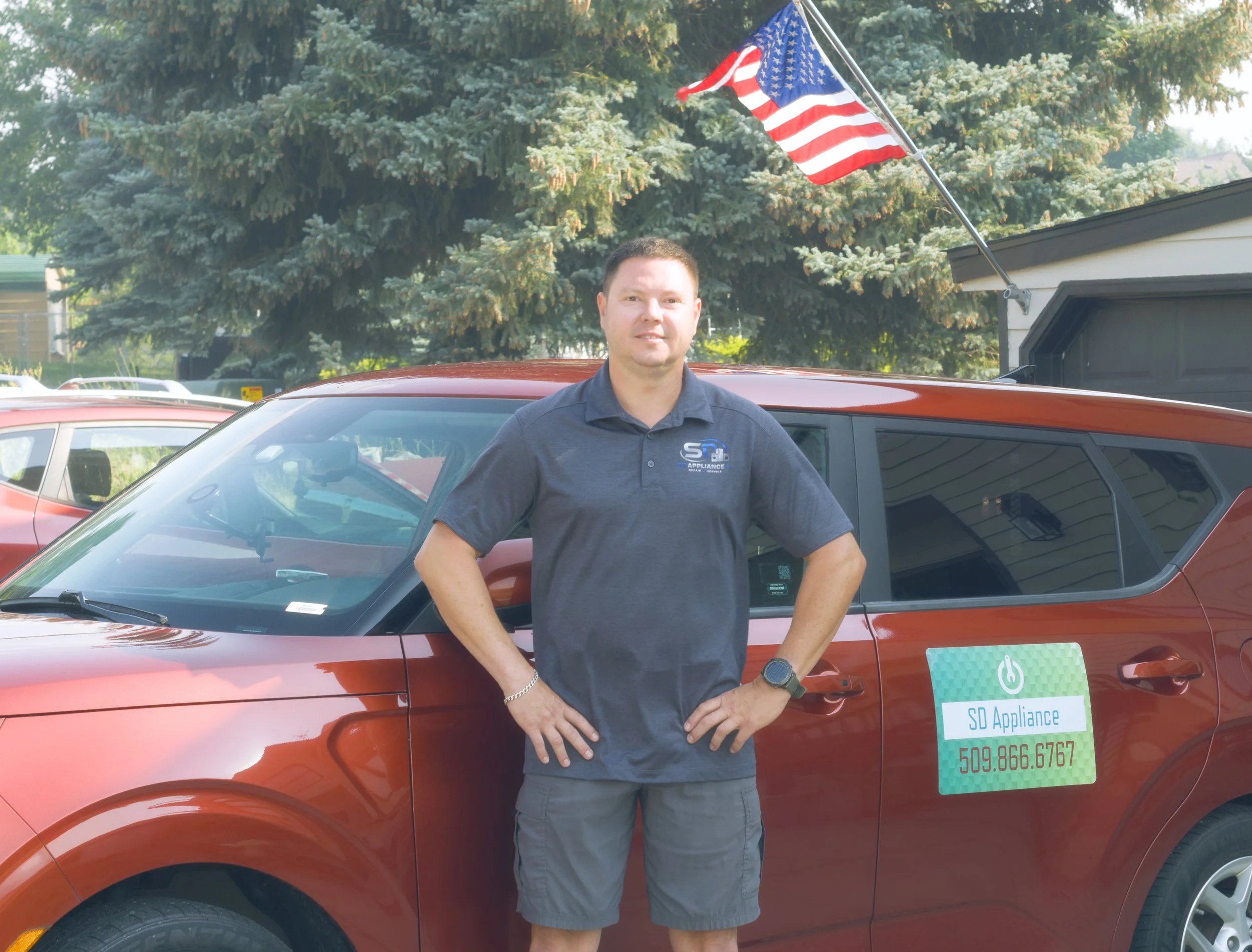 Sergei Dergunov leaning on the van on a Mead call