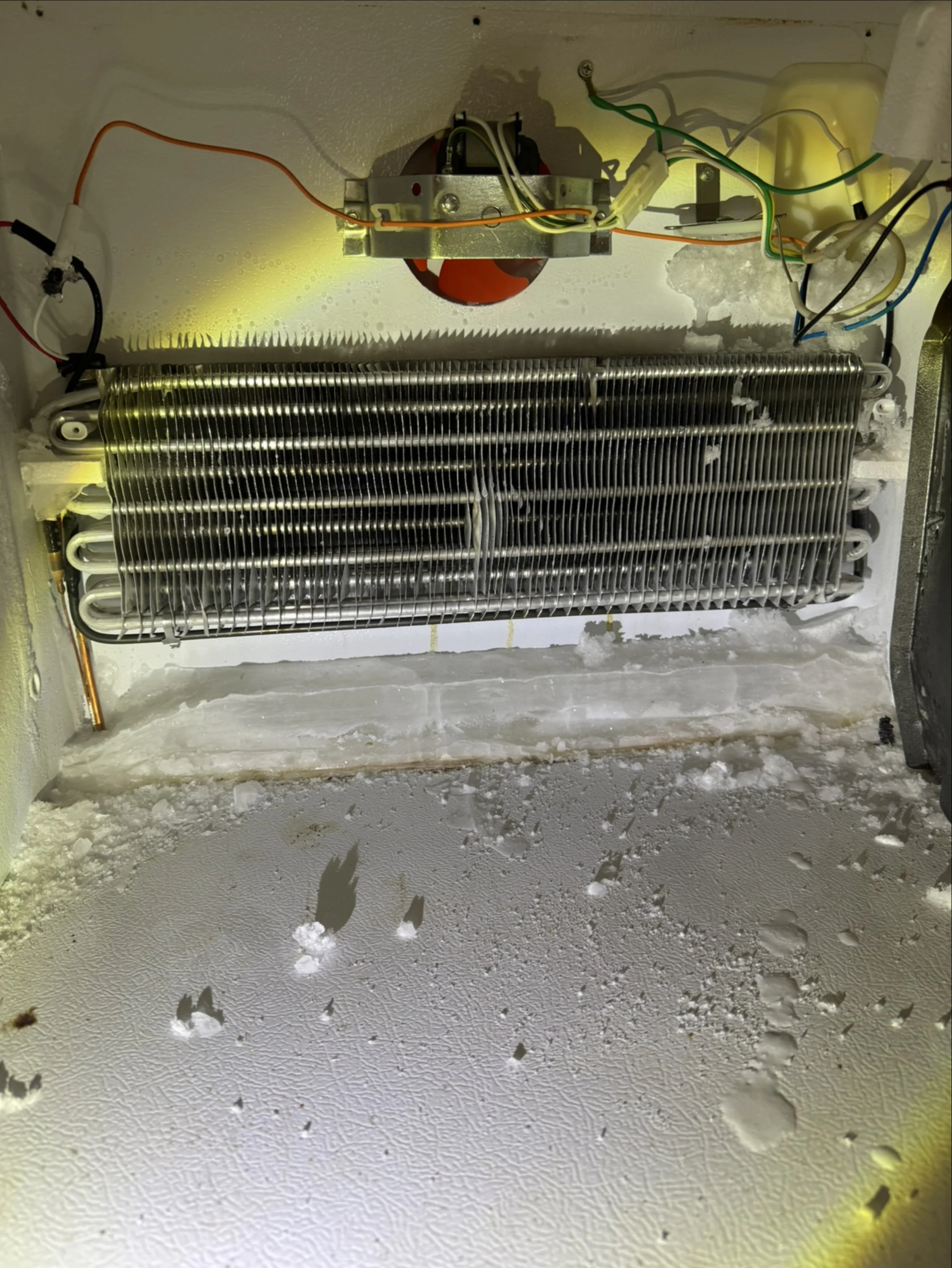 Frosted evaporator coils during an appliance repair in Spokane Valley by SD Appliance