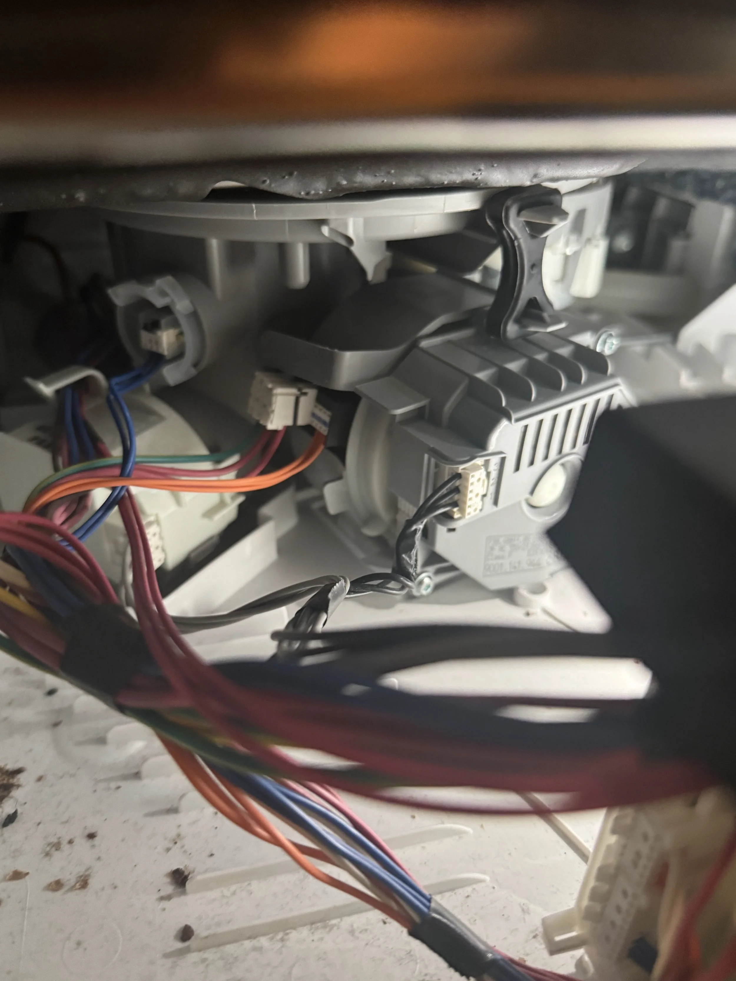 Ice chute and dispenser wiring during a Spokane refrigerator repair by SD Appliance