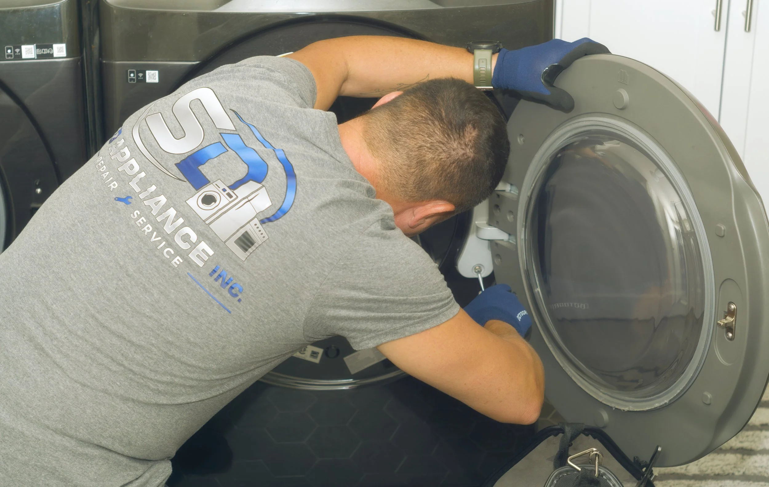 Sergei Dergunov at a washer door and gasket