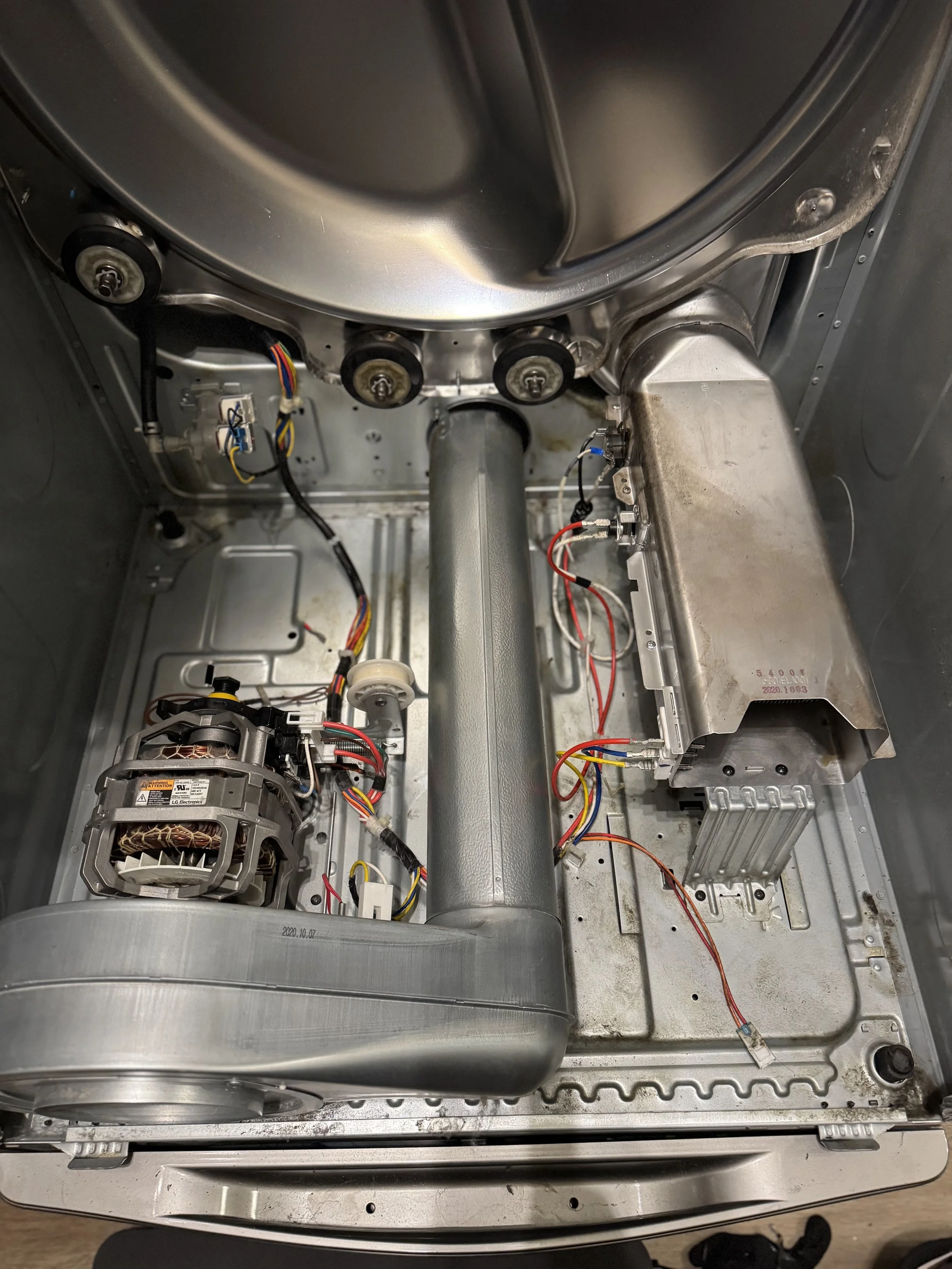Dryer interior: heating element and wiring during a Spokane dryer repair by SD Appliance