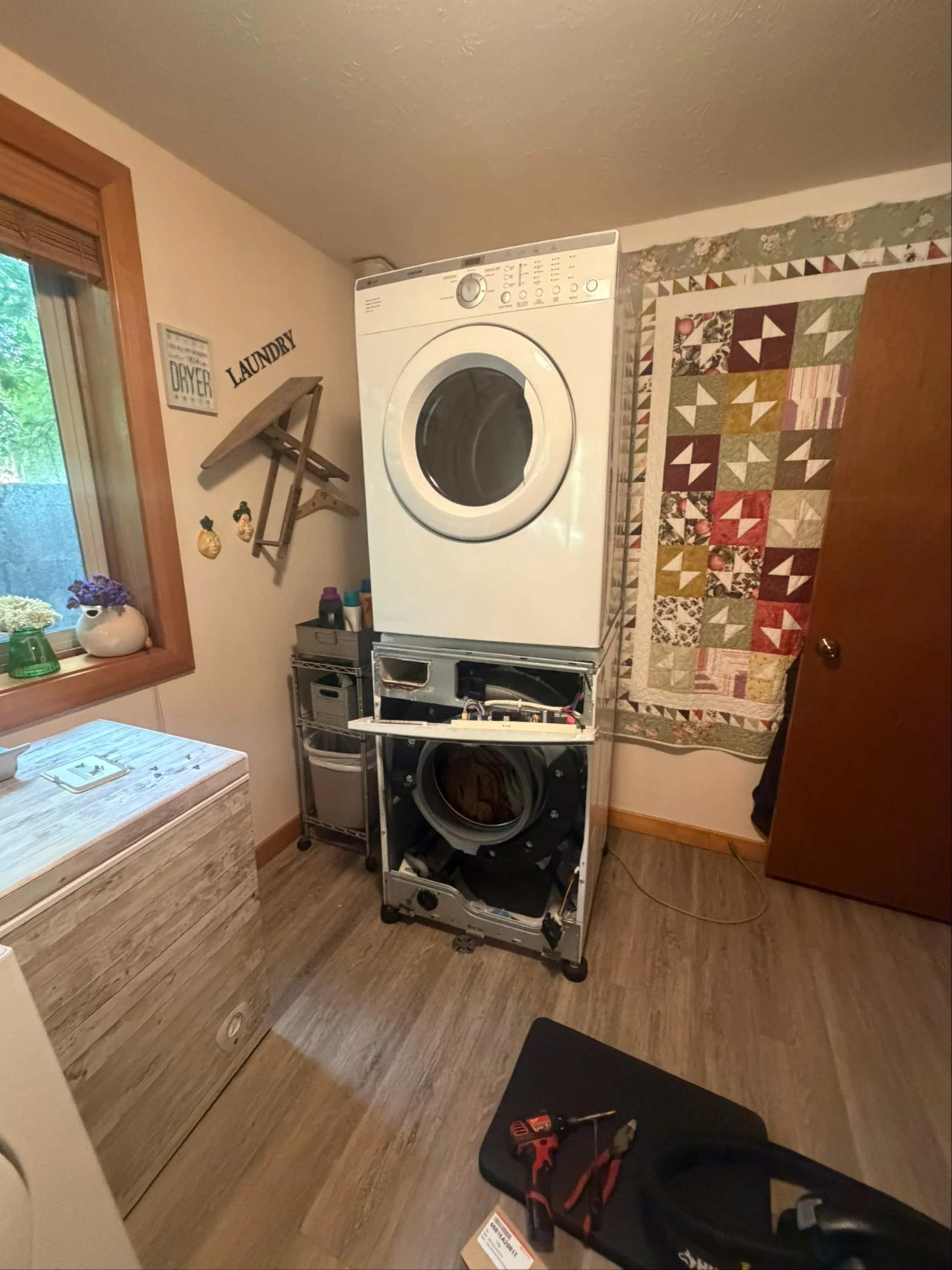Laundry room with a washer and dryer in place