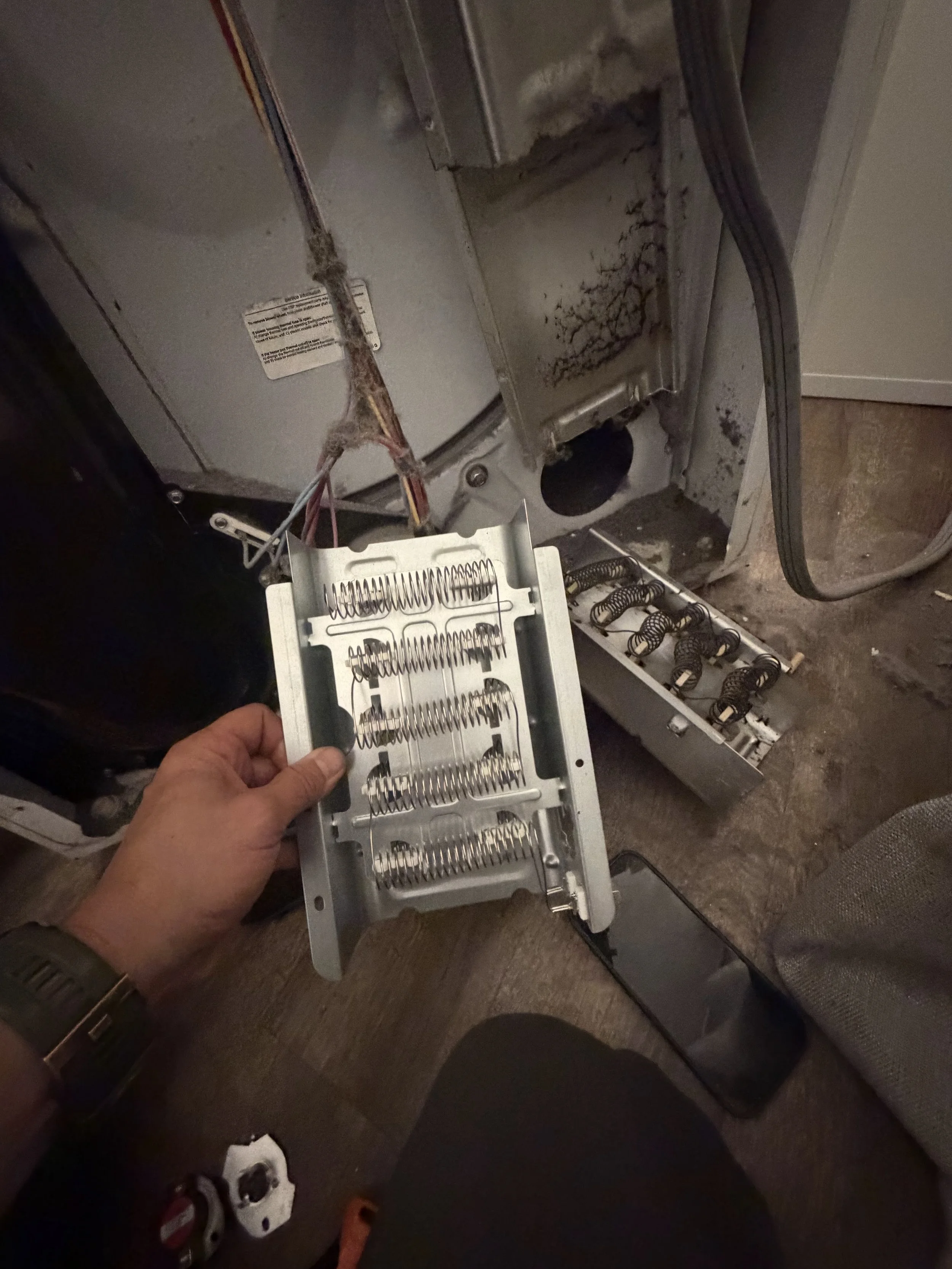 An oven bake element held in hand