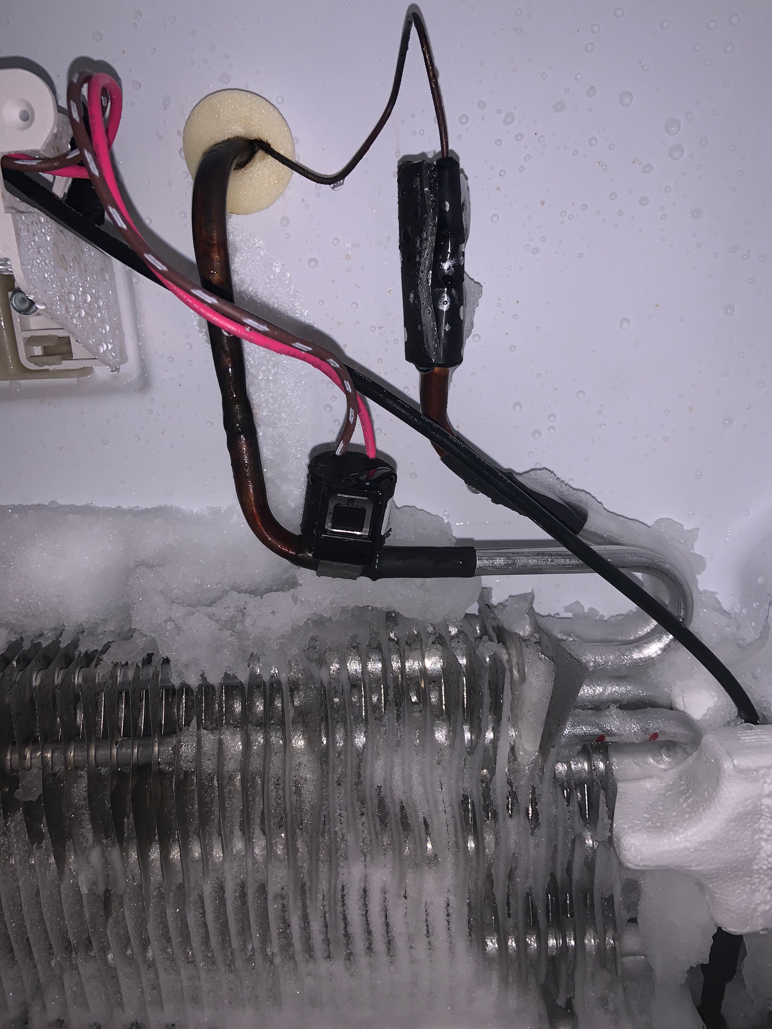 Frozen water line / ice buildup during a Spokane ice maker repair by SD Appliance