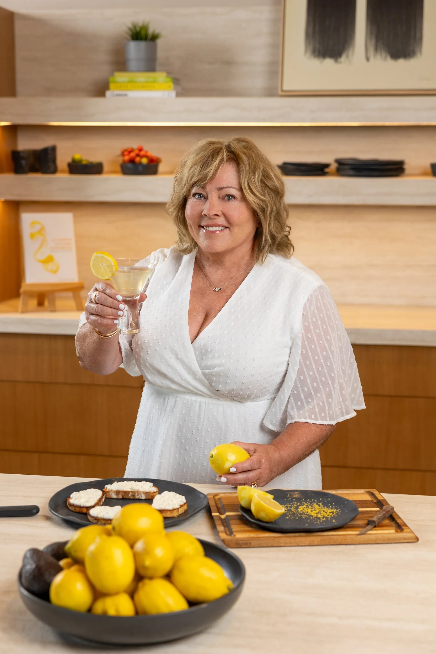 Joanna Palmer in her kitchen with a bowl of lemons