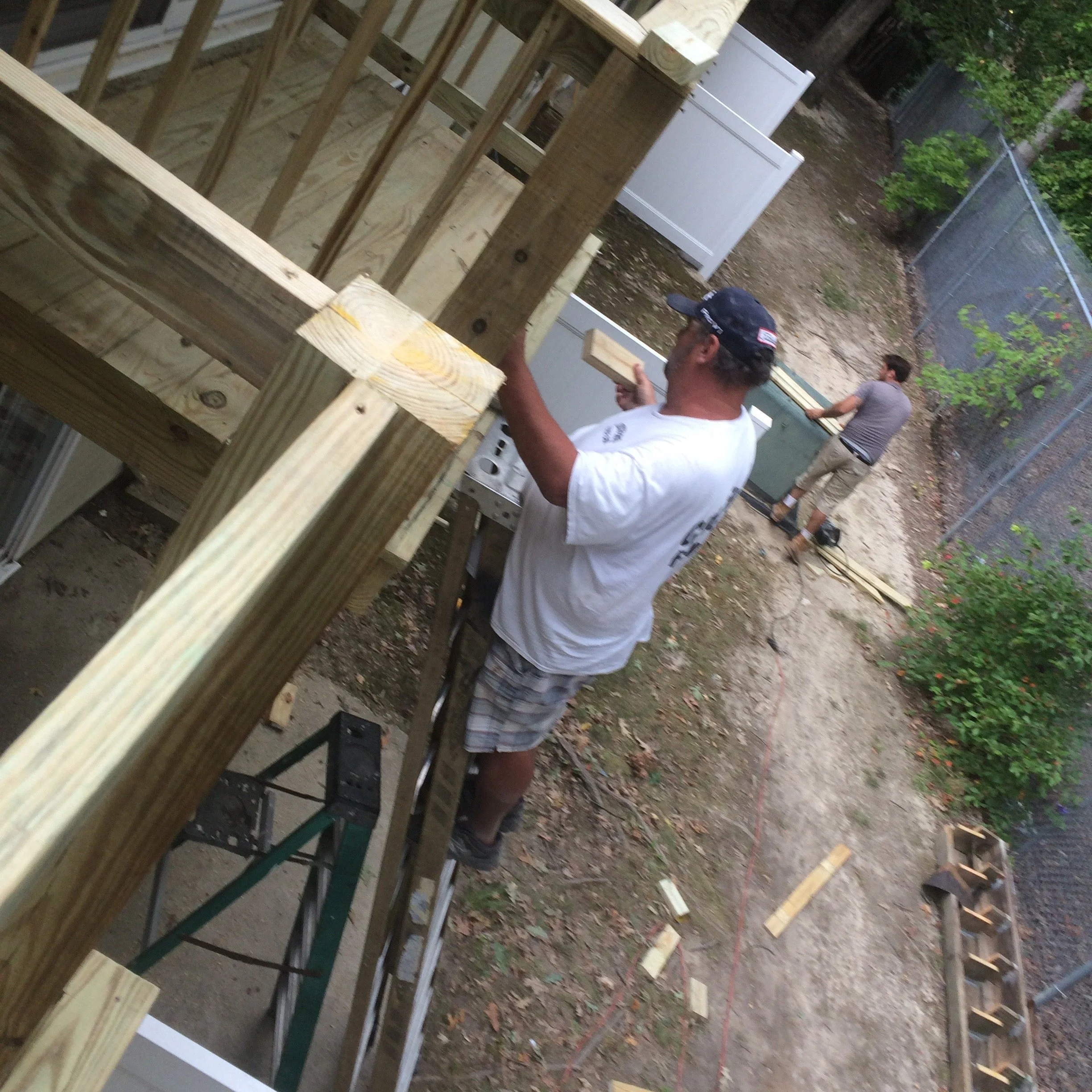 Storm-damaged fence repair by Crusberg Fence