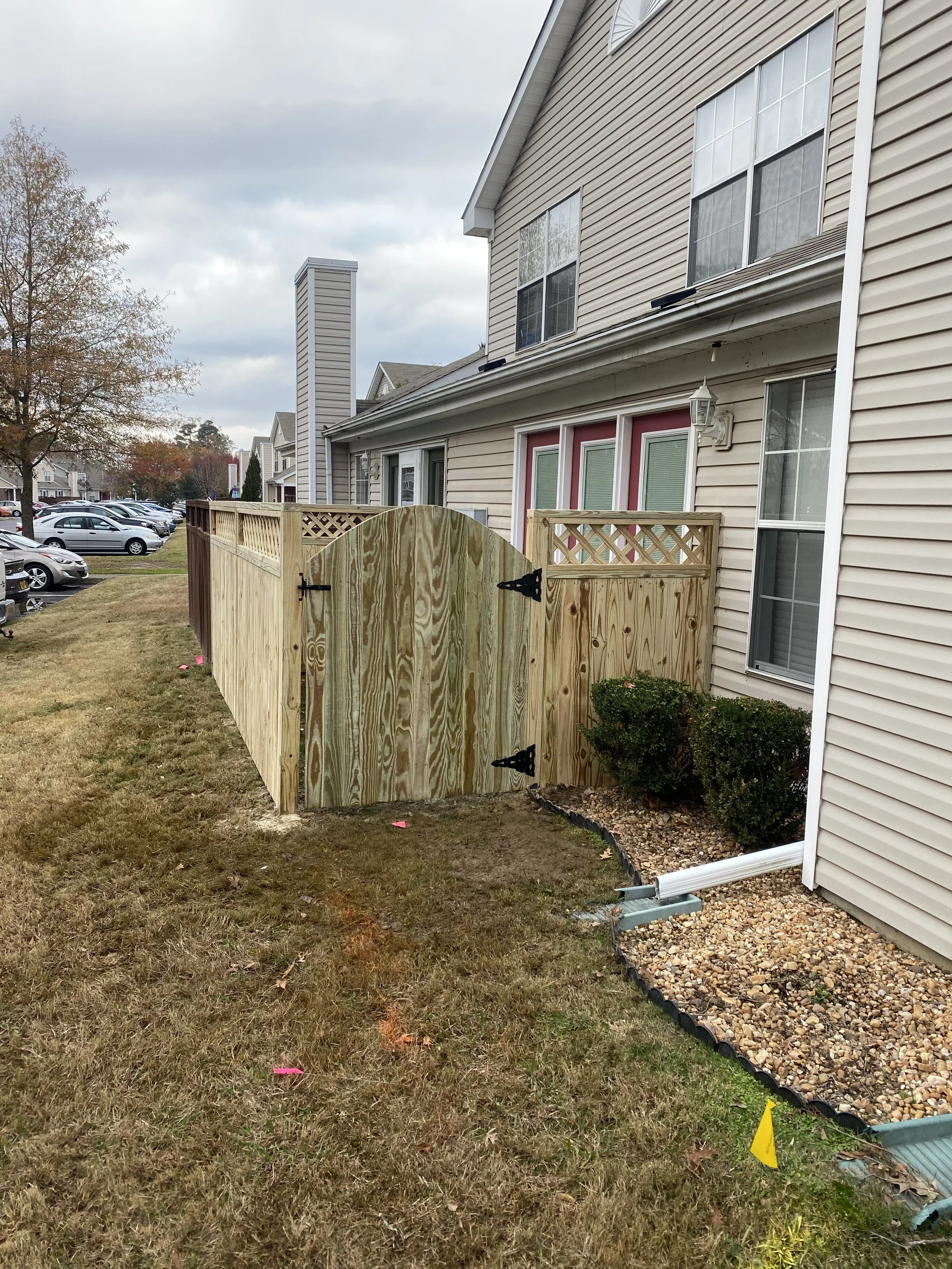 Diagonally braced wood gate frame by Crusberg Fence