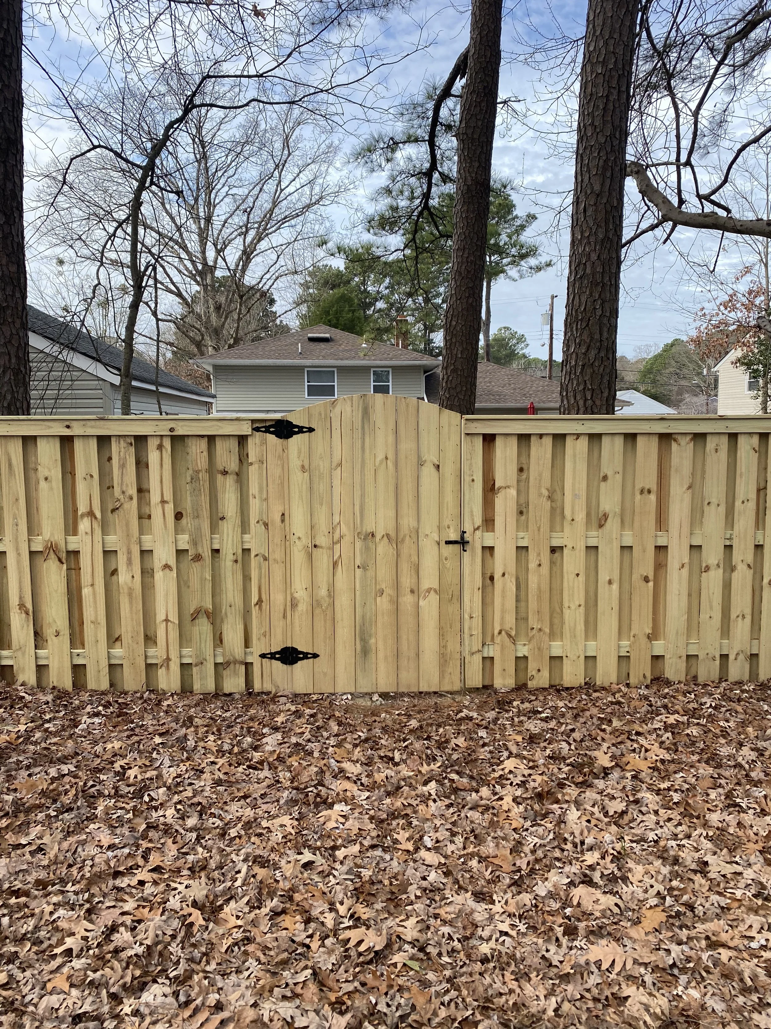 Wood gate and rail framework built by Crusberg Fence