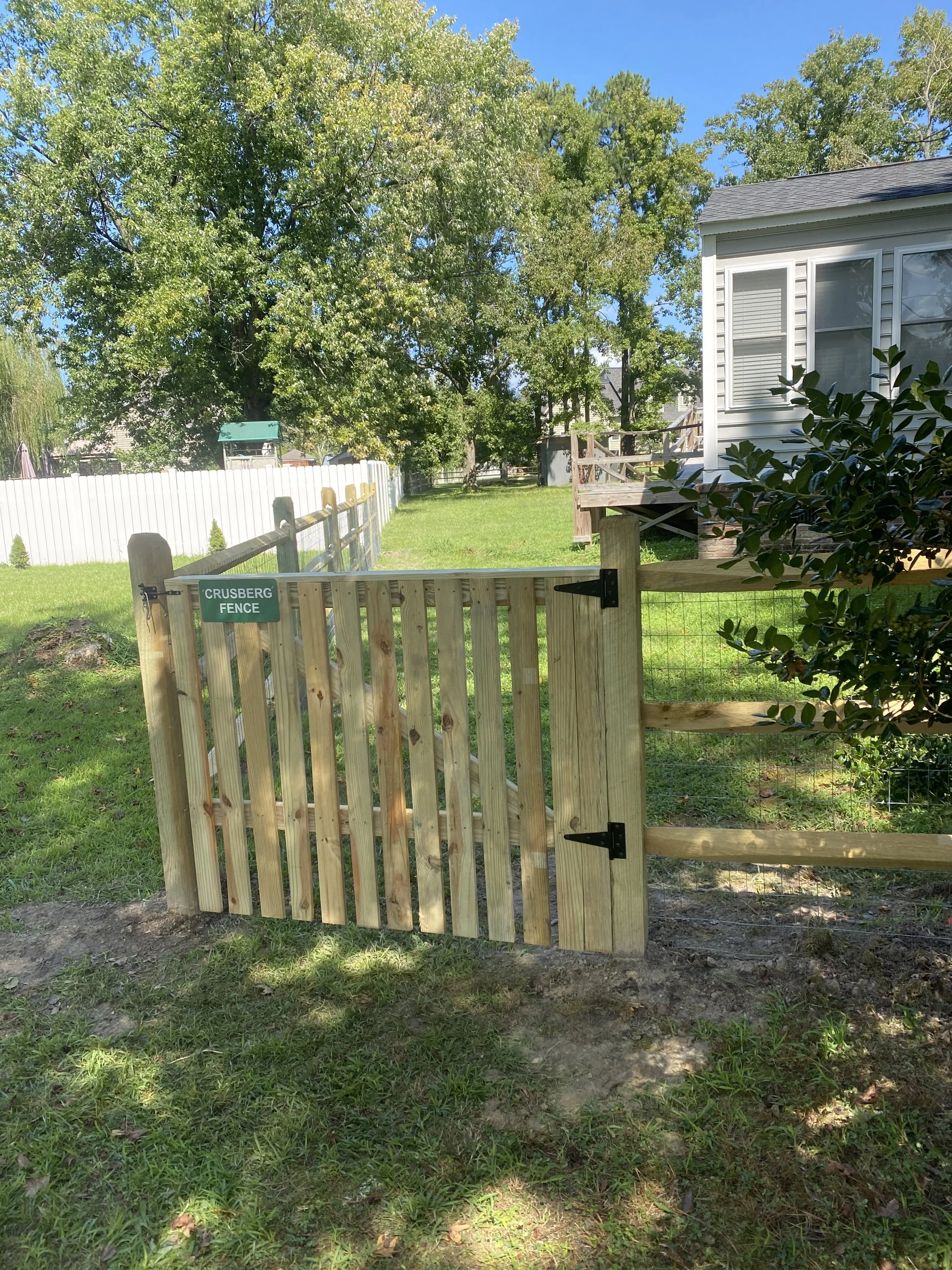 Six-foot custom wood privacy fence built by Crusberg Fence