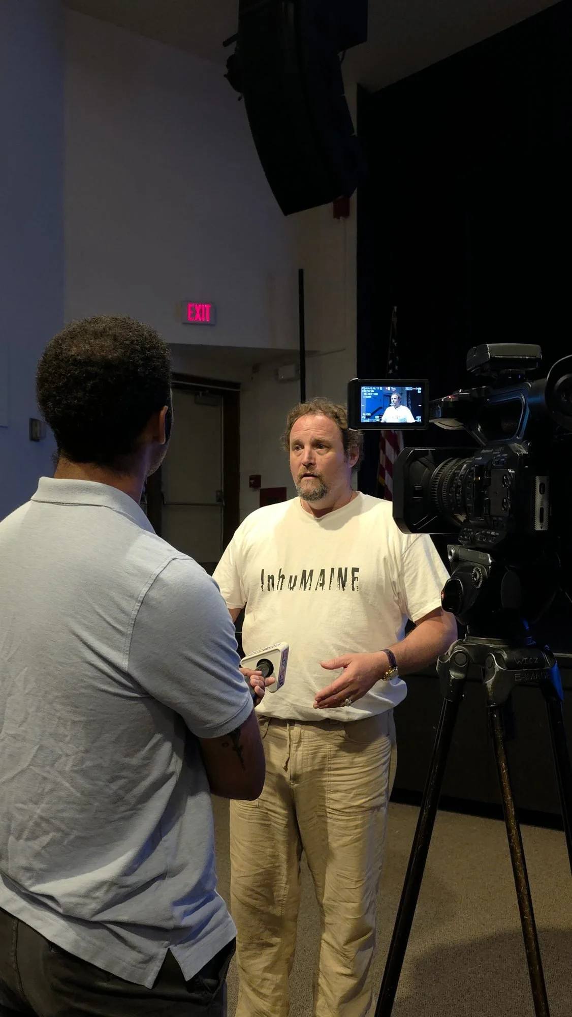 Filmmaker Rogan O'Donnell interviewed by local press at an InhuMAINE screening