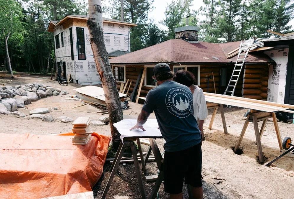 In-house blueprinting at a lake build site