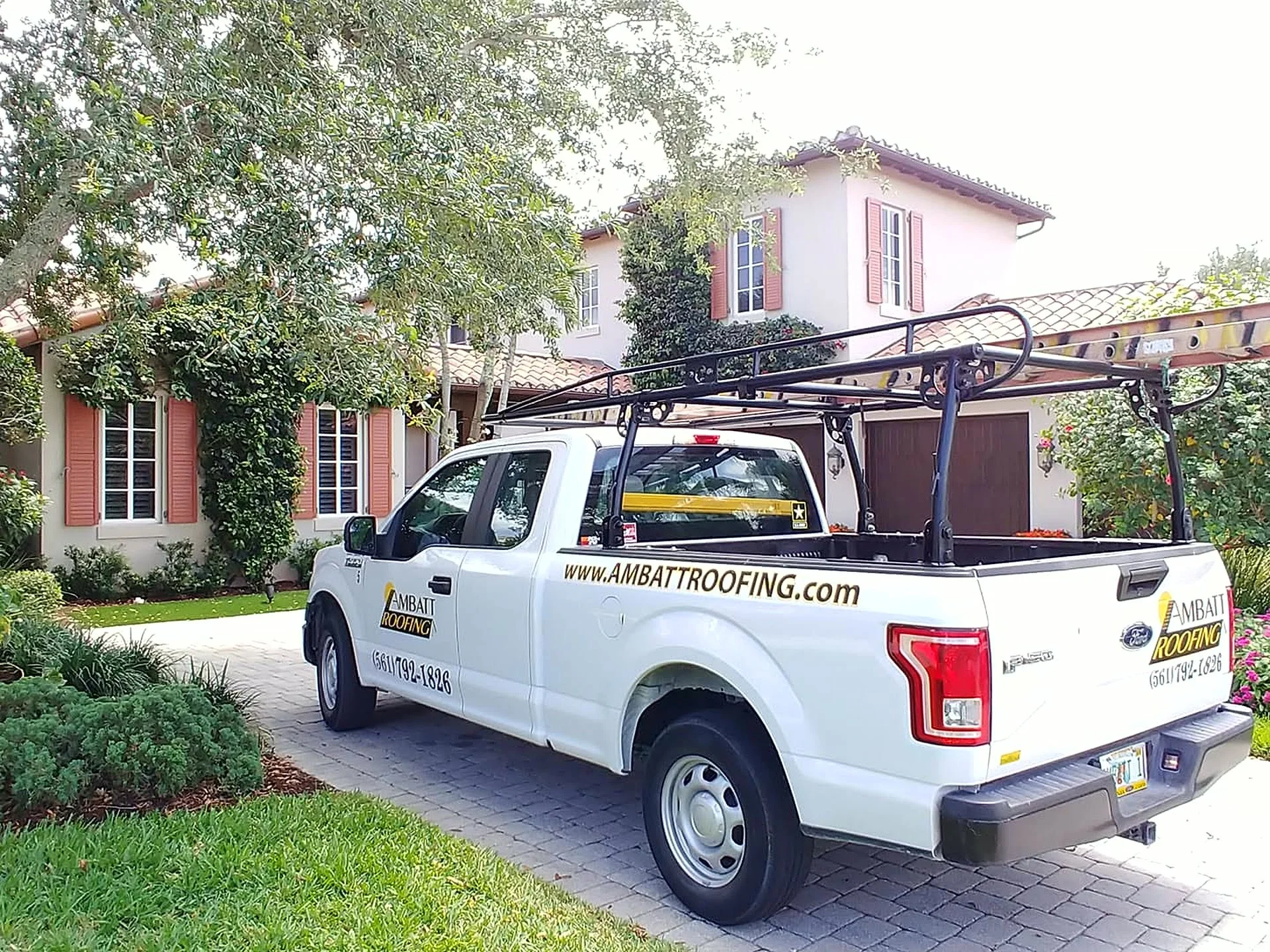 Ambatt Roofing truck at a South Florida tile-roof property