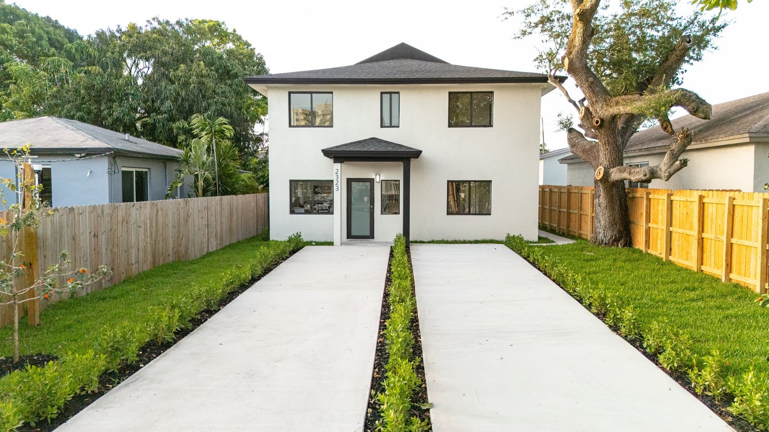 Front elevation of a two-storey new-construction home built by ARK Group Construction