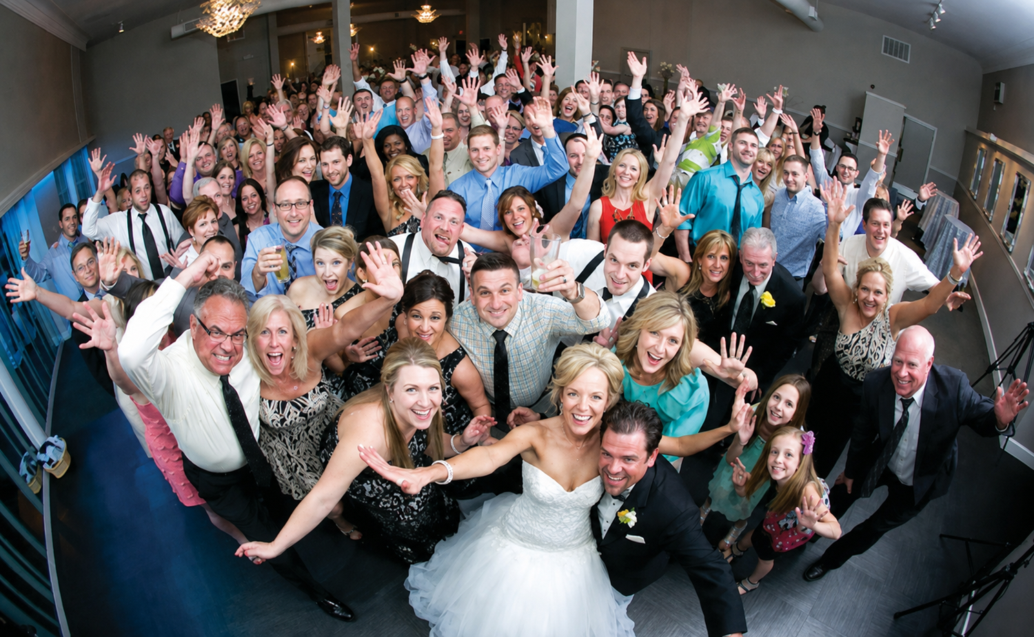 Family and wedding guests celebrating together