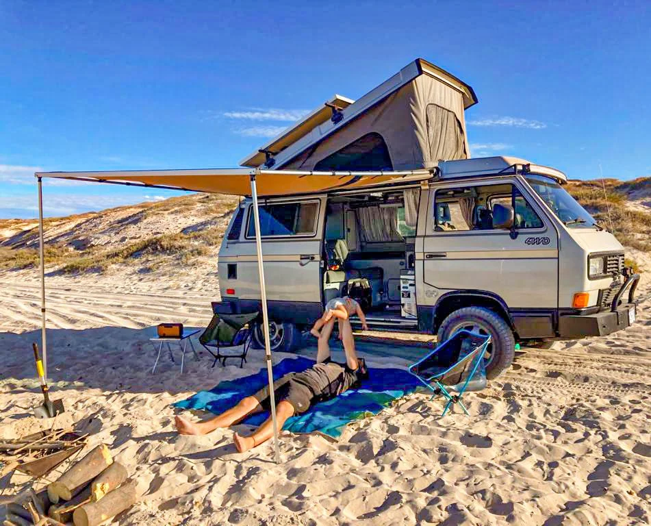 Relaxing under Miki’s awning at a beach camp near La Paz