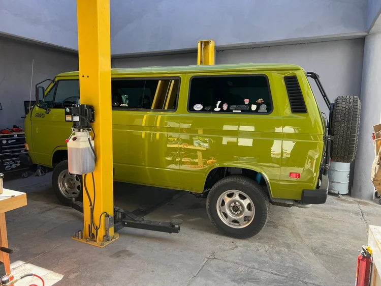 Yellow-green Volkswagen Vanagon in the workshop