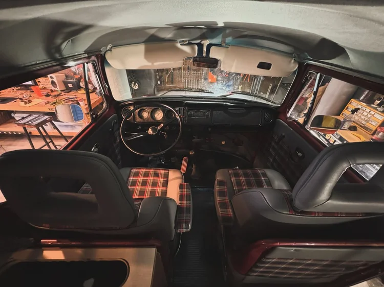 Volkswagen camper dashboard viewed from behind the front seats