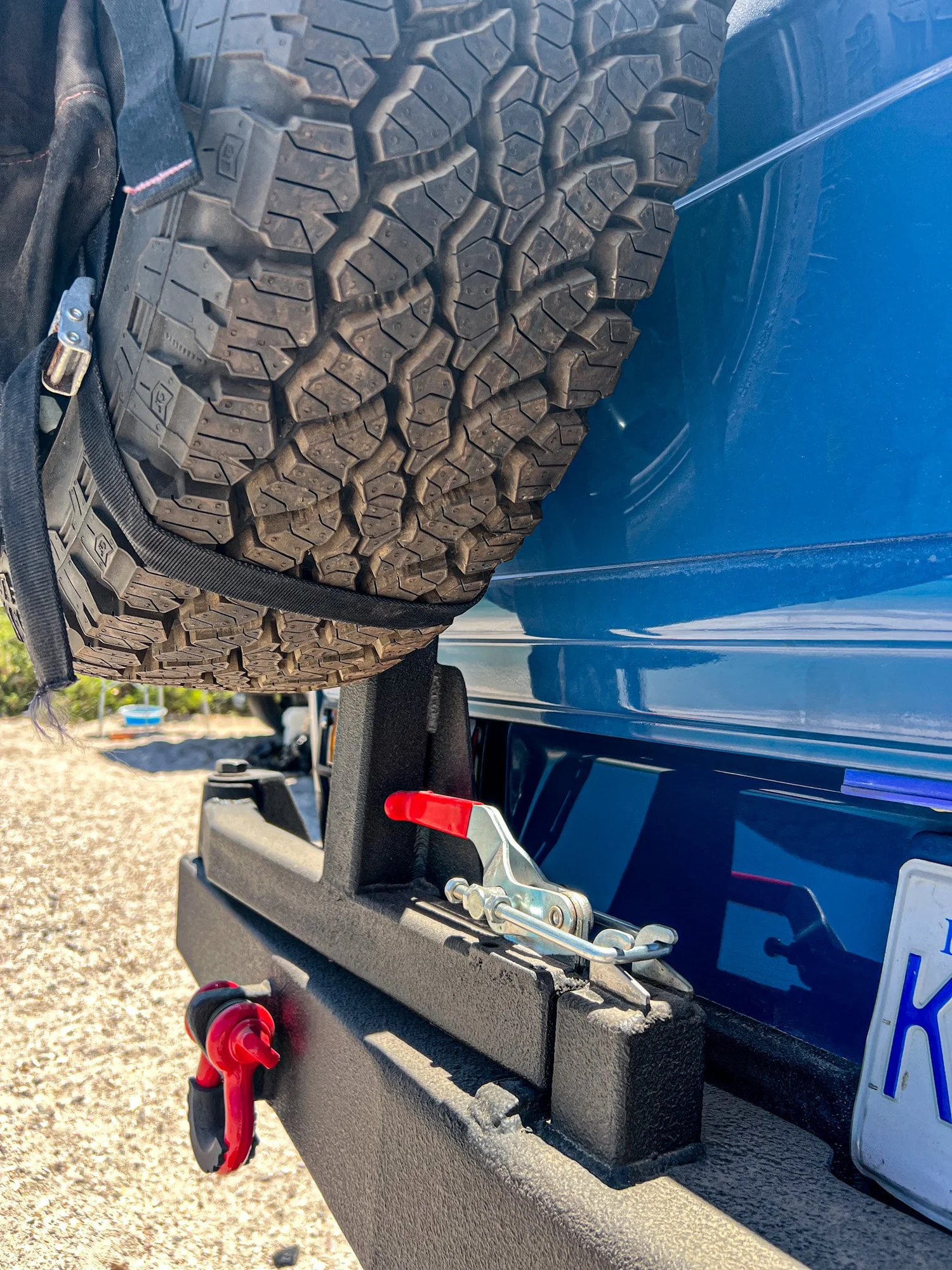 Spare-tire swing-away and latch detail.