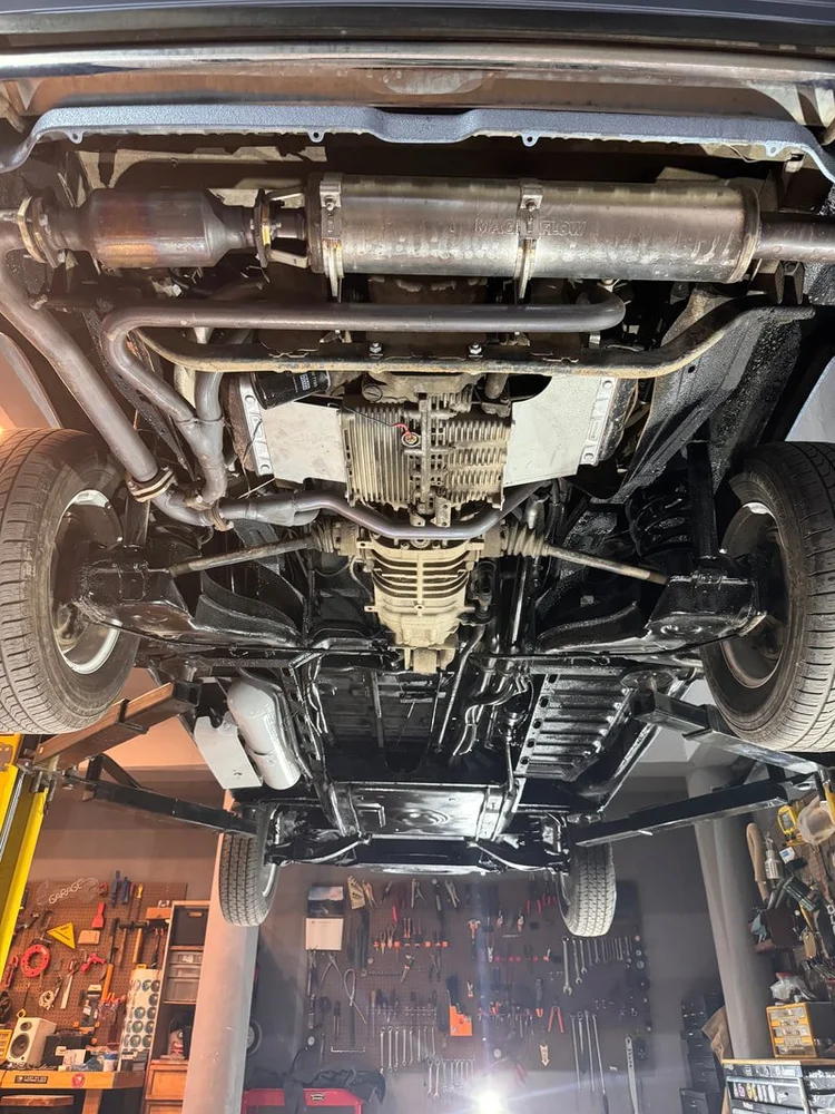 Underside of a Volkswagen van on a workshop lift