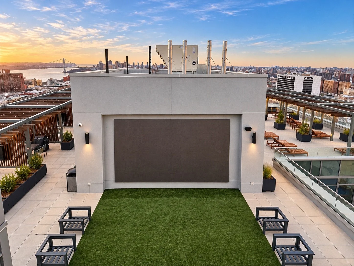 Large display installed on the rooftop wall in daylight