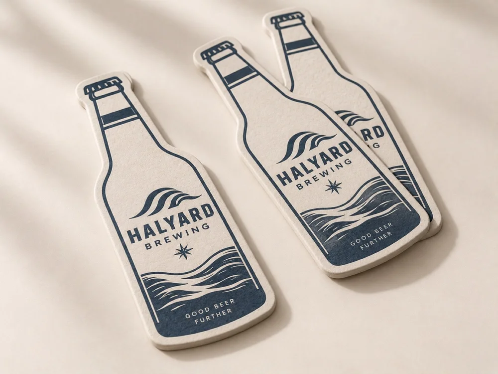 Die cut custom beer coasters in a bottle shape