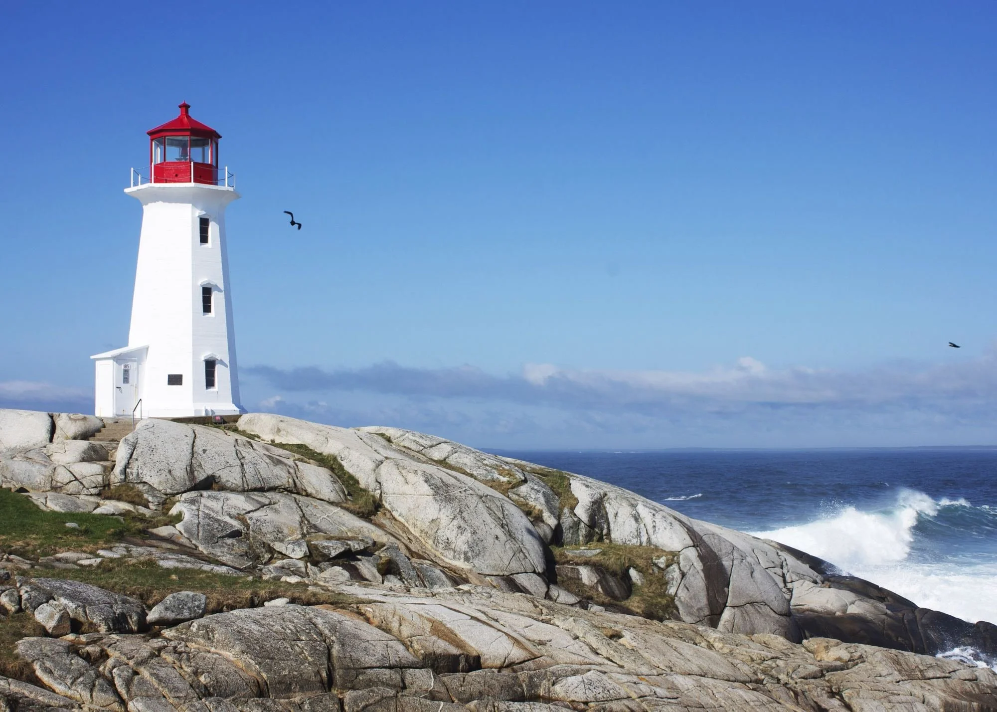 Peggy's Point Lighthouse on granite rocks, Peggy's Cove, Nova Scotia