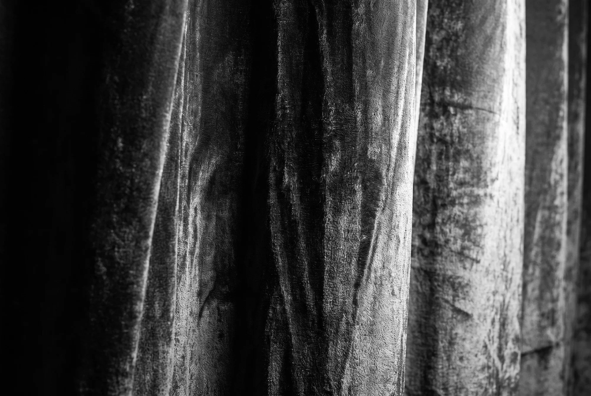 Soft light on theatrical curtains