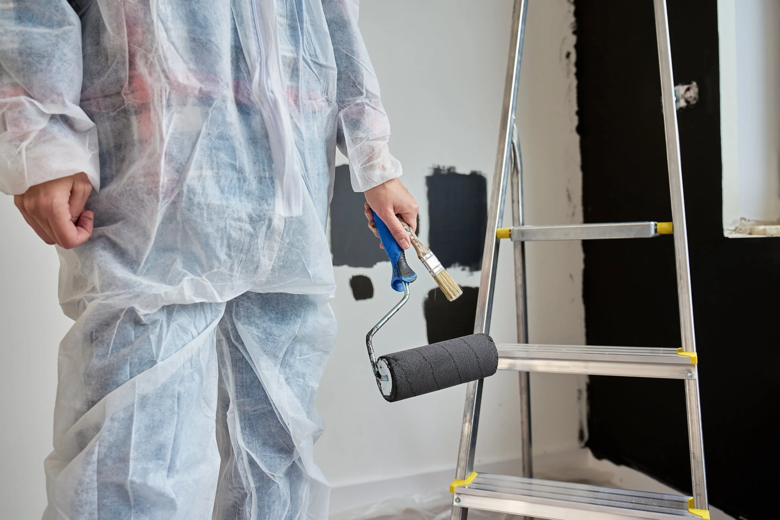 Interior painting with roller and brush