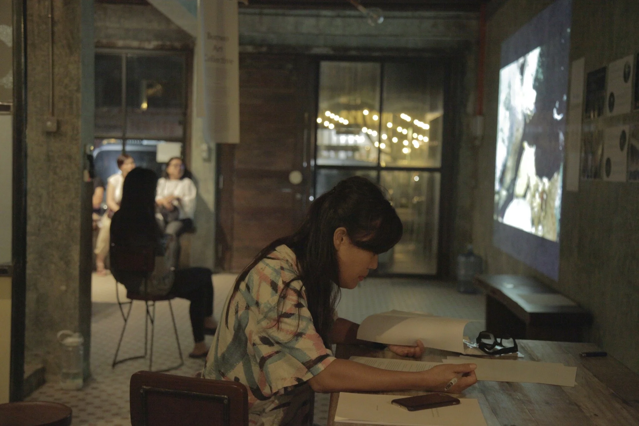 Vera at a desk in the Borneo installation space